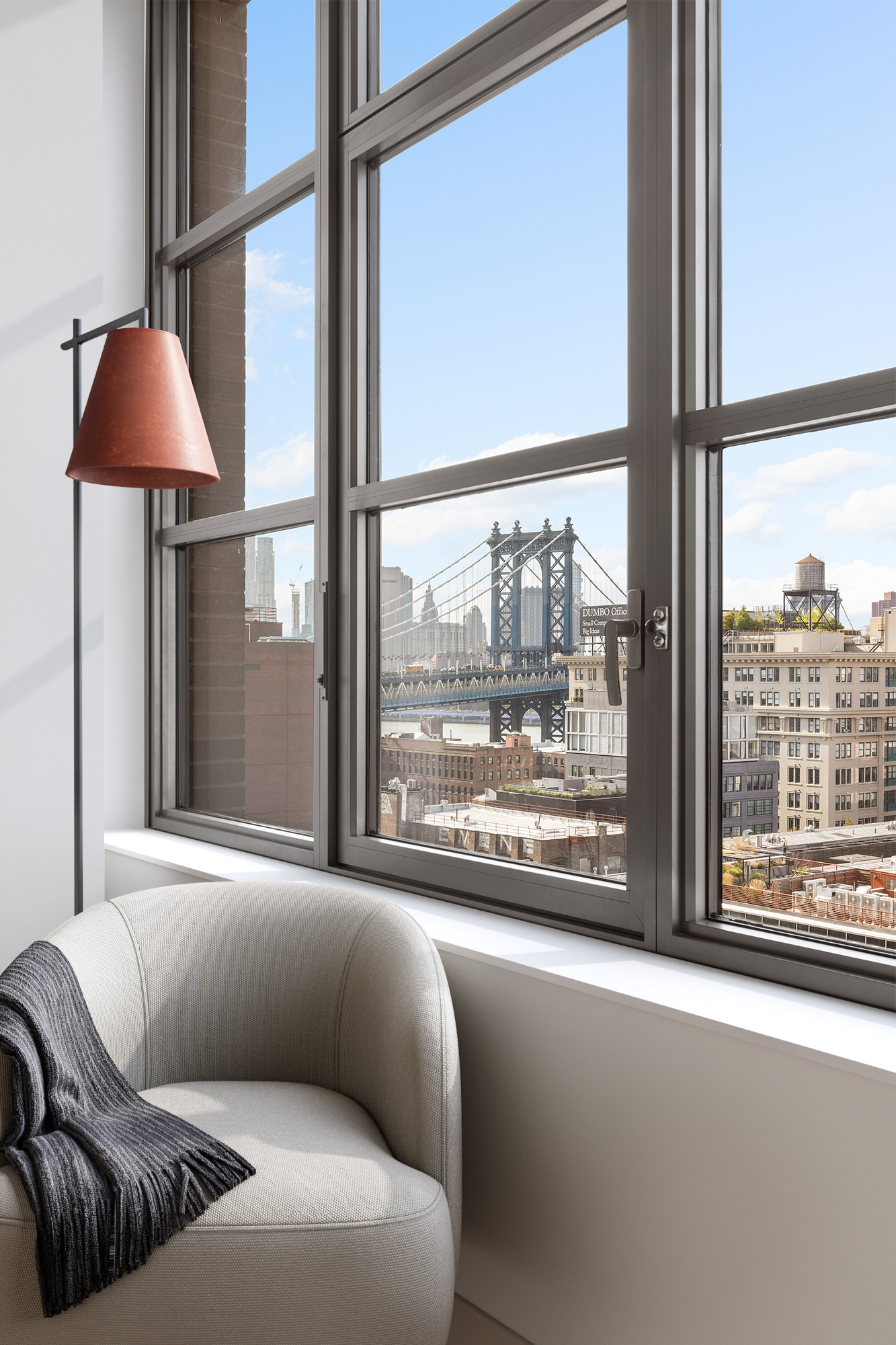 115 York Street, Unit 11C Brooklyn, NY 11201 - Photo 7 of 25 a living room with furniture and a window