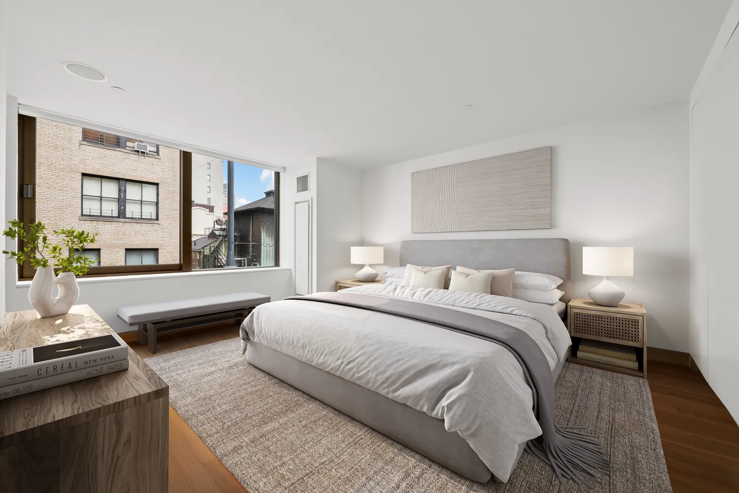 a bedroom with a bed and a couch