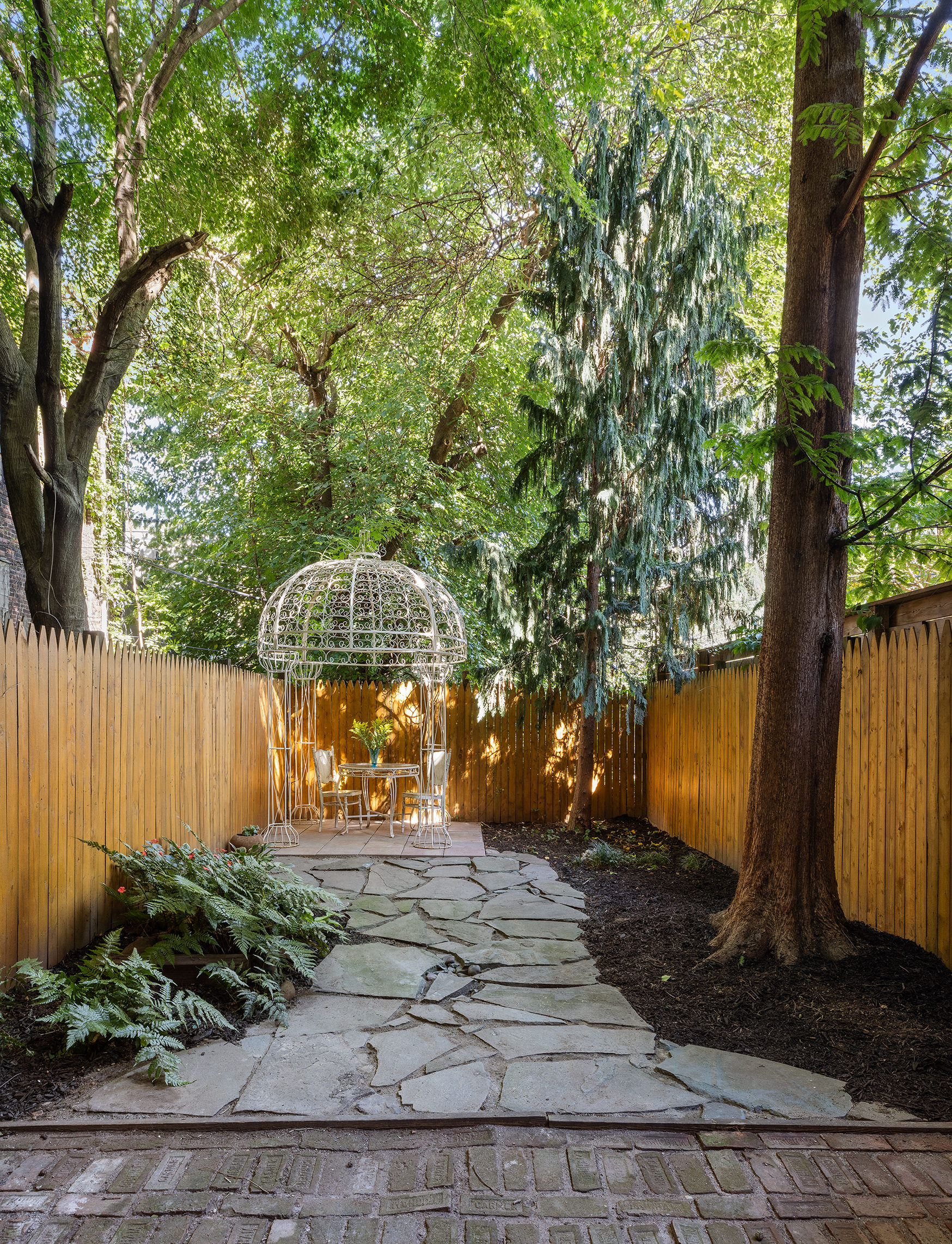 37 Quincy Street Brooklyn, NY 11238 - Photo 21 of 24 a backyard of a house with lots of green space