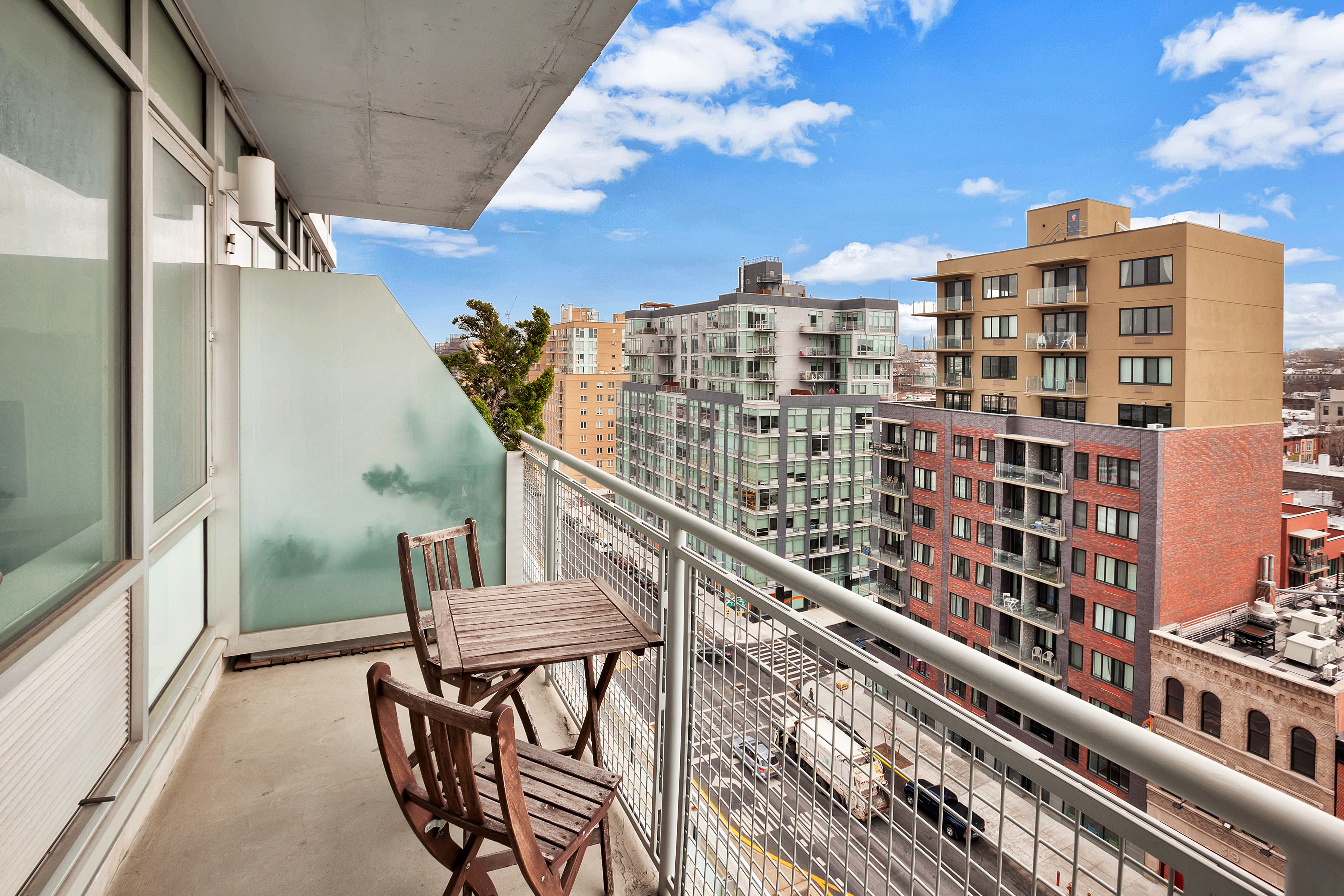 251 7th Street, Unit 10C Brooklyn, NY 11215 - Photo 3 of 15 a view of a balcony with chairs