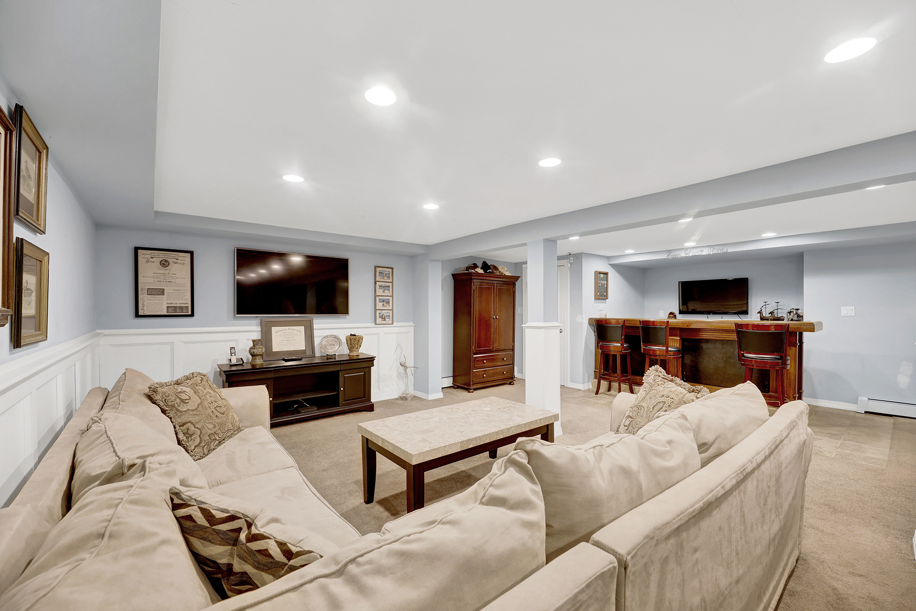 142-15 Newport Avenue Queens, NY 11694 - Photo 35 of 72 a living room with furniture and a flat screen tv