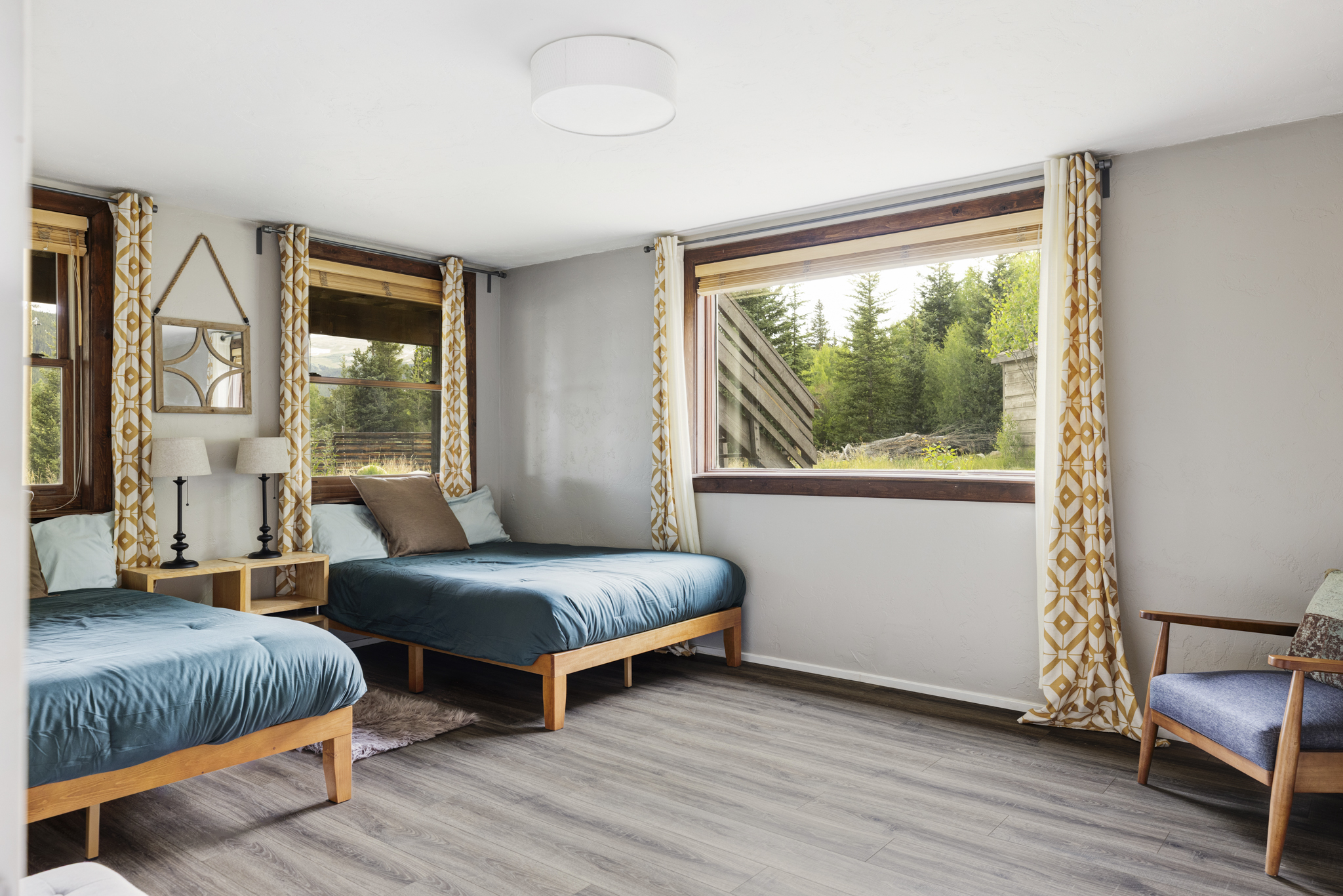 133 Gold Run Road Alma, CO 80420 - Photo 24 of 46 a bedroom with two beds and a large window