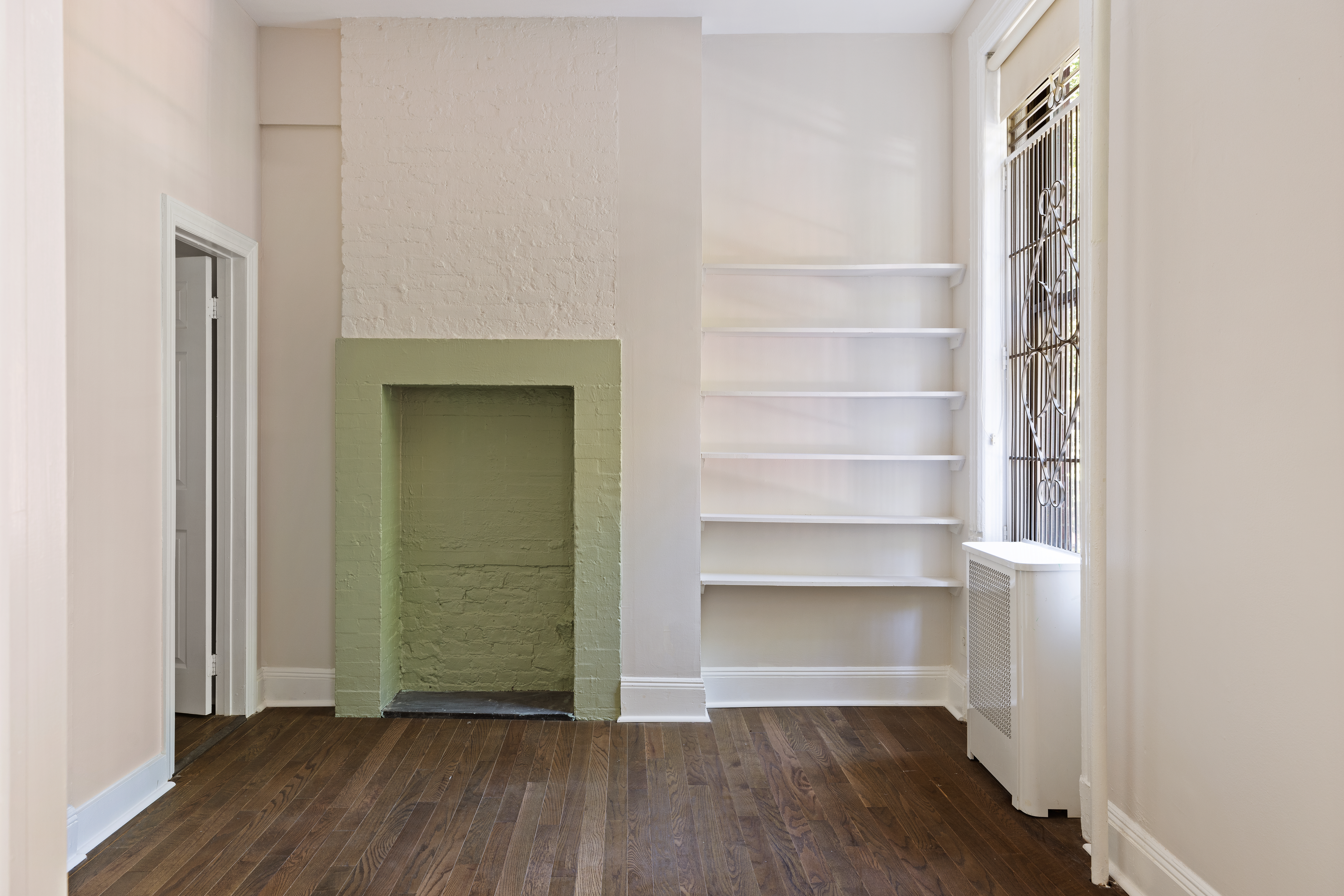 280 Clinton Street, Unit 1 Brooklyn, NY 11201 - Photo 8 of 11 a view of a room with wooden floor and a window