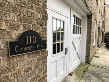 a sign that is on the side of a building