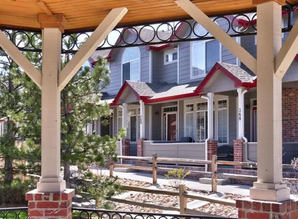 front view of a house with a small yard