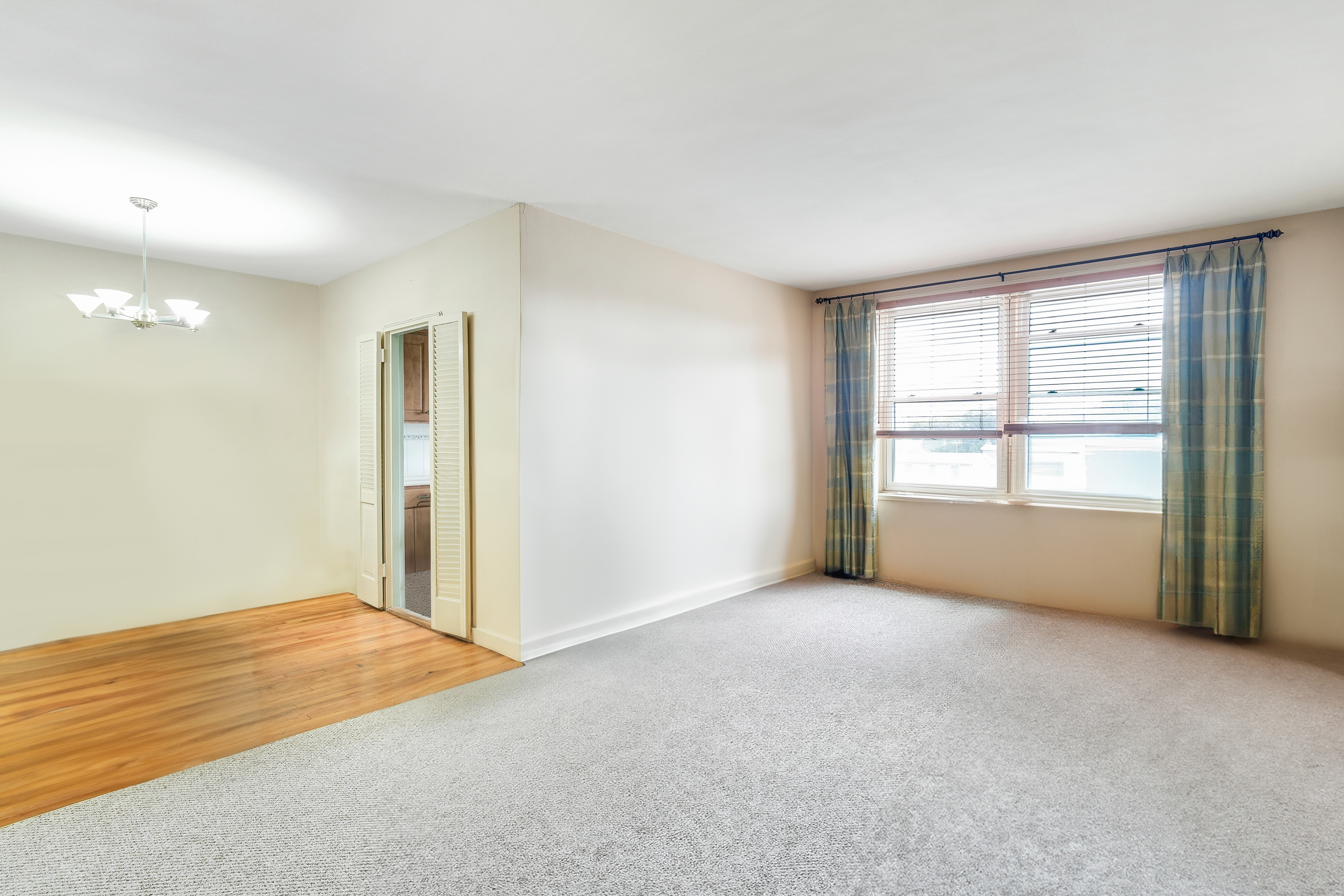 9801 Shore Road, Unit 3E Brooklyn, NY 11209 - Photo 2 of 9 a view of an empty room with a window
