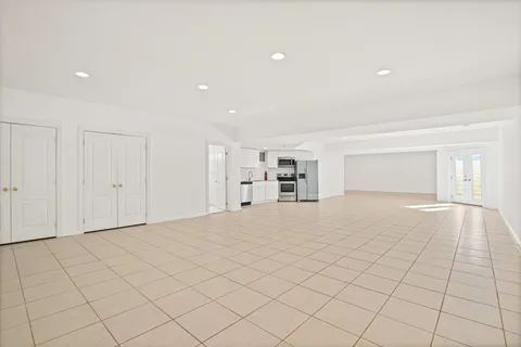 a kitchen with cabinets stainless steel appliances and a counter top