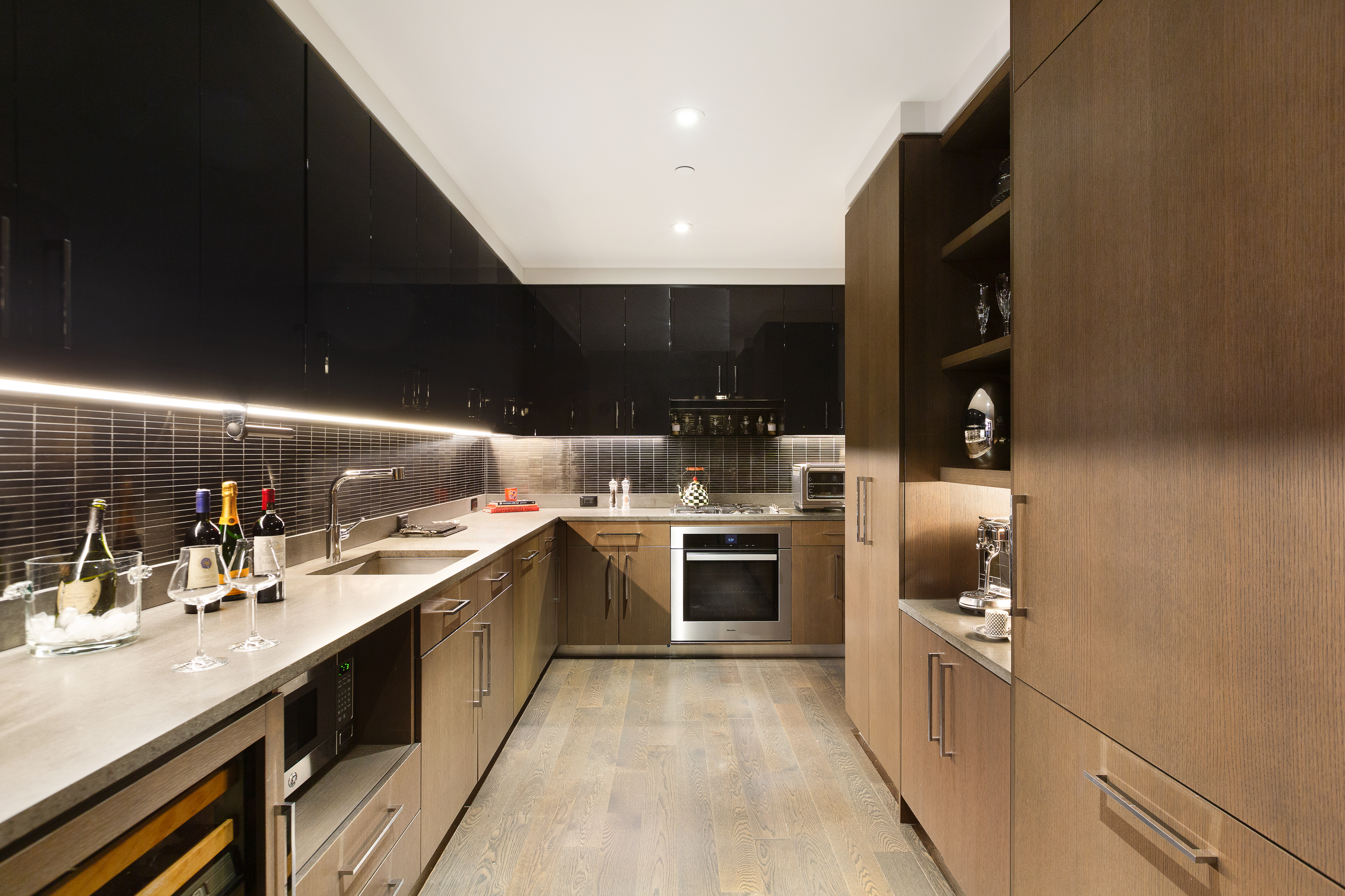 50 Riverside Boulevard, Unit 14L Manhattan, NY 10069 - Photo 11 of 22 a kitchen with stainless steel appliances granite countertop a sink a stove and a refrigerator