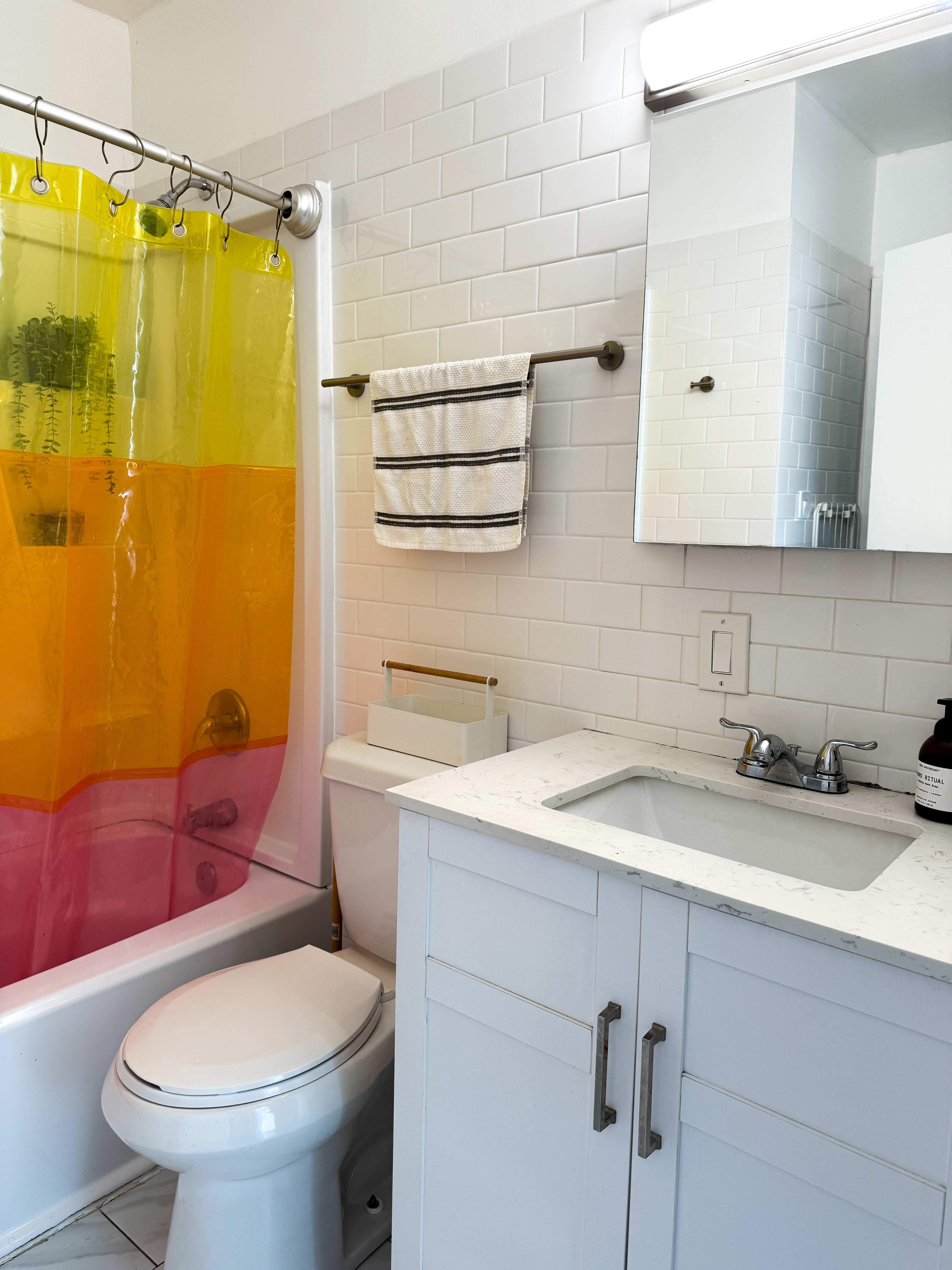 65 South 4th Street, Unit 2 Brooklyn, NY 11249 - Photo 9 of 12 a bathroom with a sink a toilet and shower