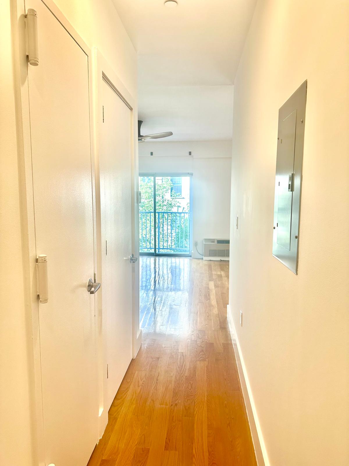 221 West 148th Street, Unit 4A Manhattan, NY 10039 - Photo 6 of 11 a view of a bathroom with a glass door