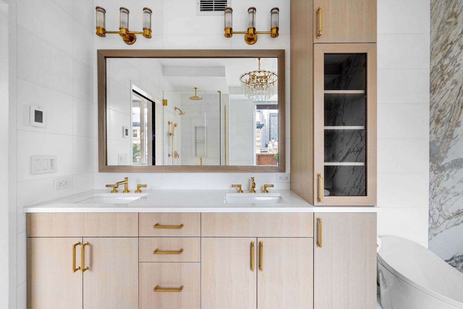 a bathroom with a sink vanity and a mirror