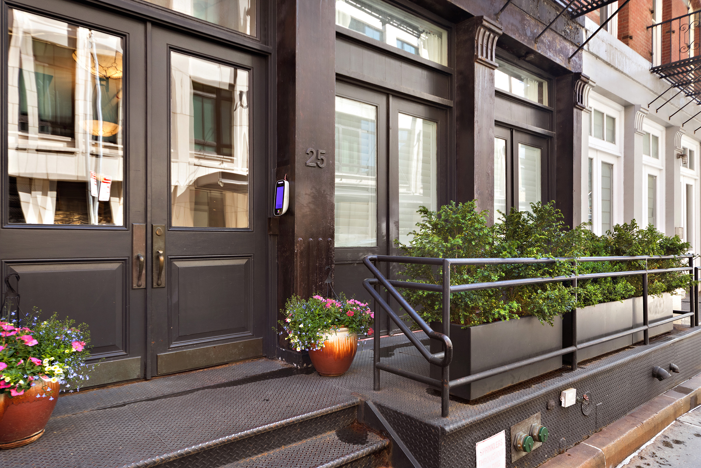 25 Leonard Street, Unit 2 New York, NY 10013 - Photo 11 of 12 a view of a chairs and table in a balcony
