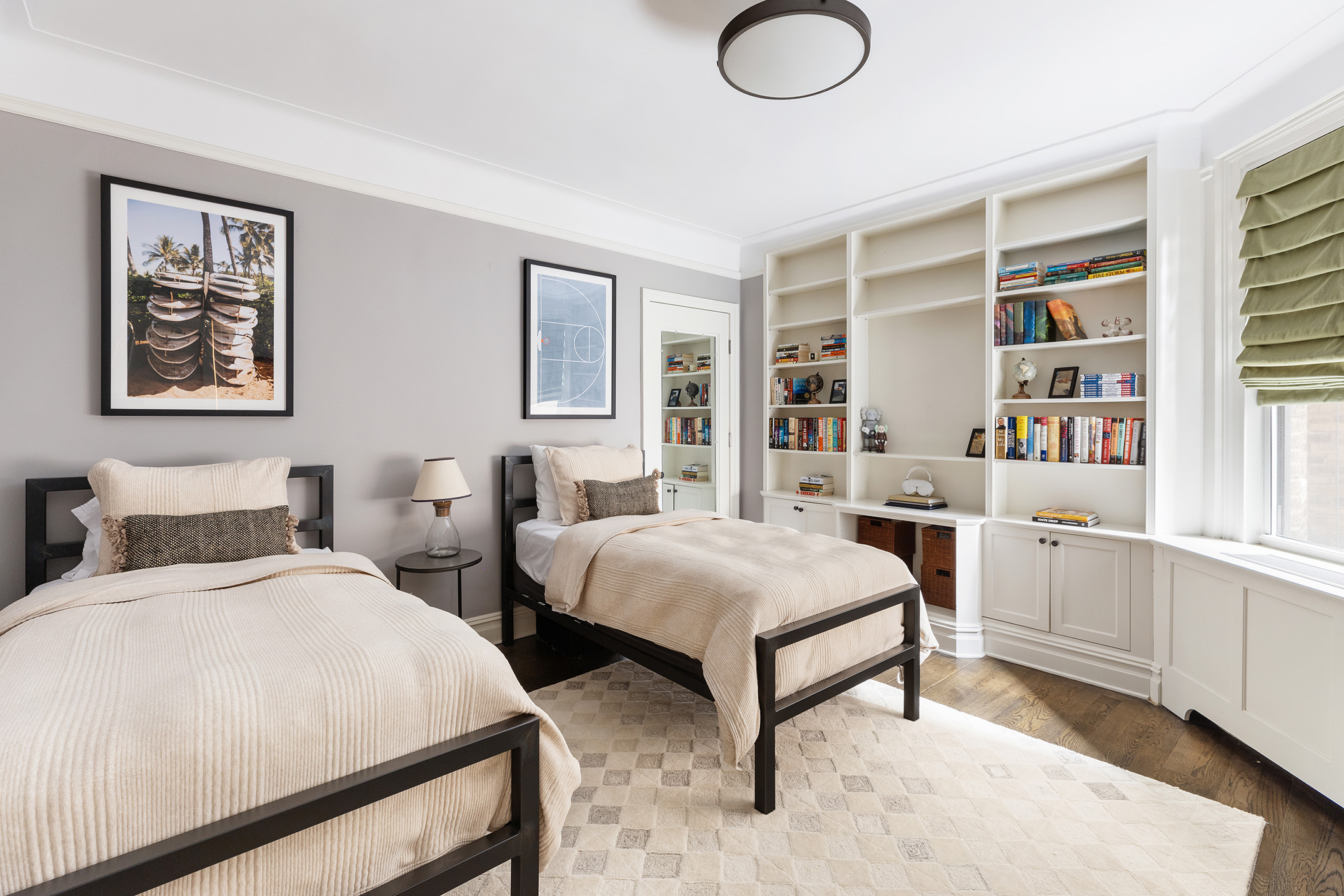 174 West 76th Street, Unit 4GH Manhattan, NY 10023 - Photo 11 of 16 a spacious bedroom with two beds and a desk