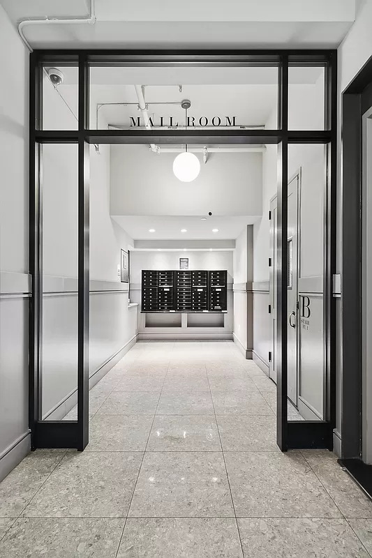 180 Bainbridge Street, Unit 111 Brooklyn, NY 11233 - Photo 21 of 25 a view of entryway and hall with a fireplace