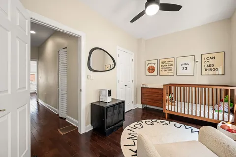 a bedroom with furniture and a window