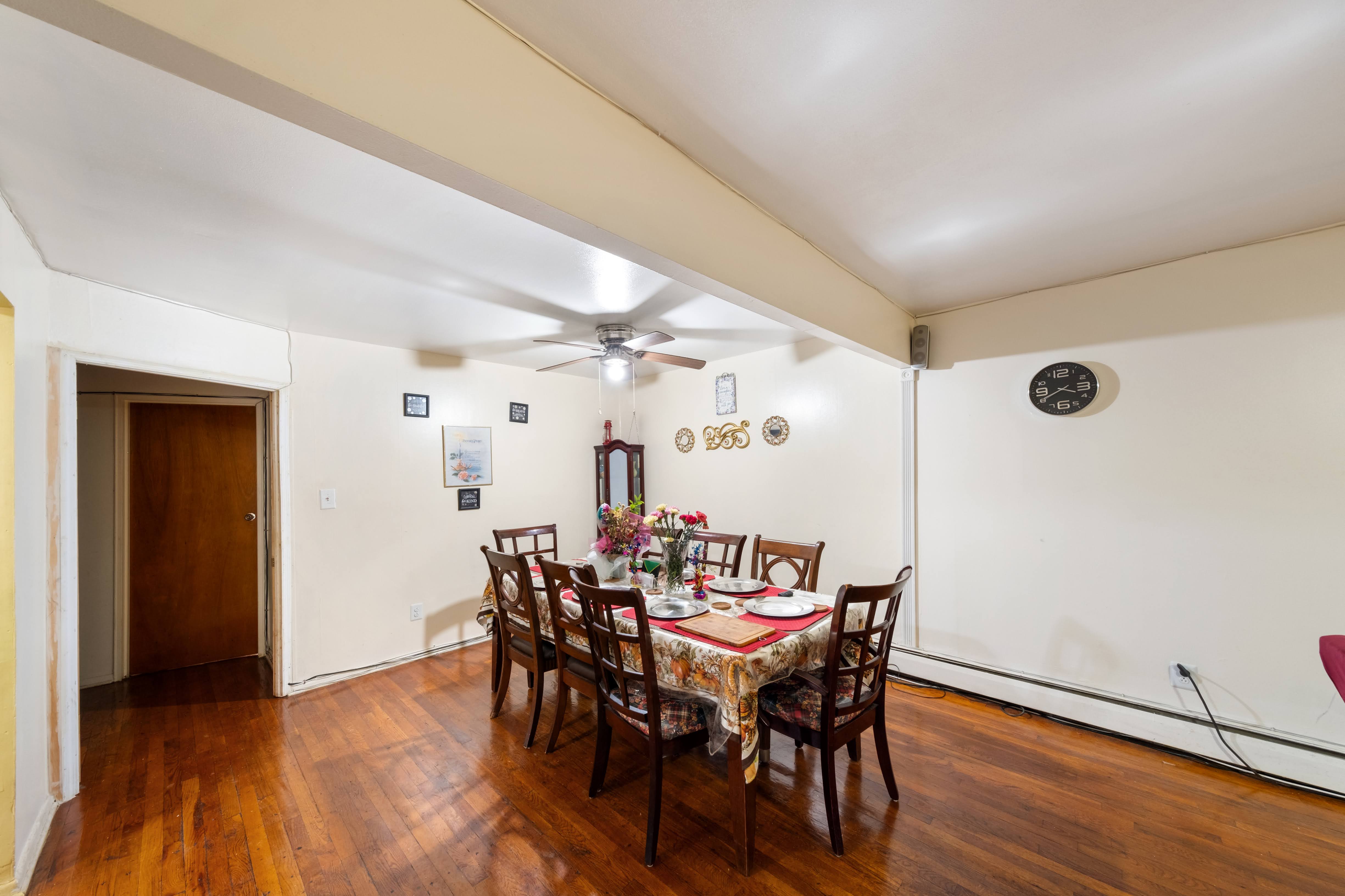 1464 East 84th Street Brooklyn, NY 11236 - Photo 4 of 22 a view of a dining room with furniture and wooden floor