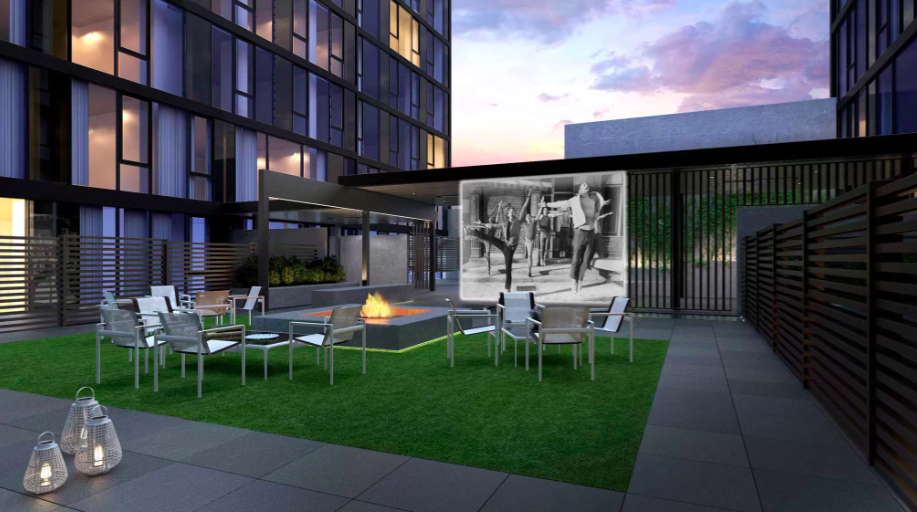 540 West 49th Street, Unit 401S Manhattan, NY 10019 - Photo 13 of 14 a view of a chair and tables in the patio in front of a house