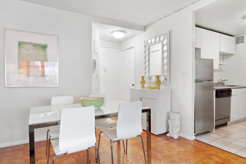 50 Lexington Avenue, Unit 15D Manhattan, NY 10010 - Photo 2 of 10 a view of a dining room with furniture