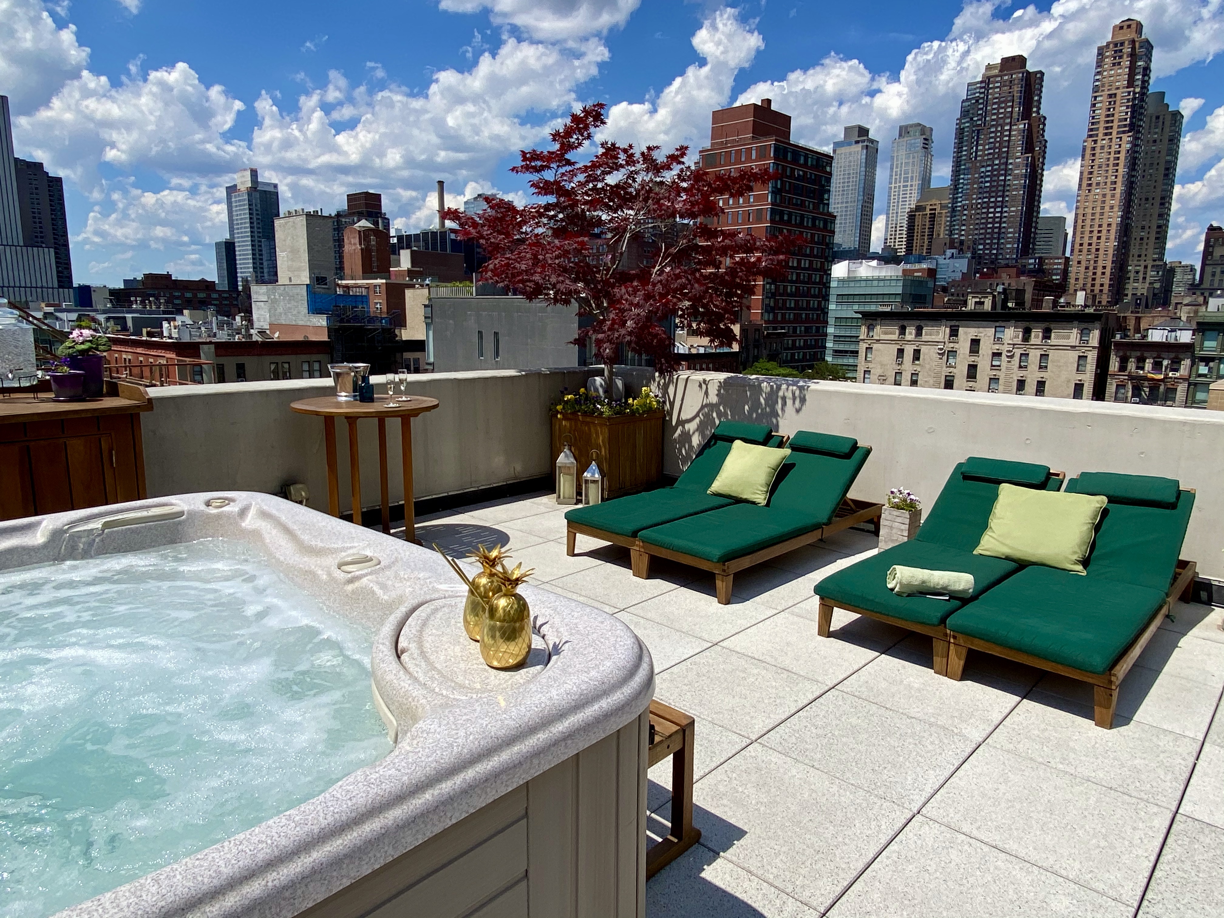 350 West 53rd Street, Unit PHB Manhattan, NY 10019 - Photo 20 of 34 a view of a chairs and table in a patio