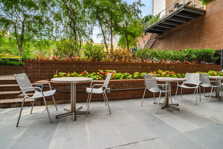 515 East 72nd Street, Unit 3KLMN Manhattan, NY 10021 - Photo 24 of 29 a view of a chairs and tables in a patio