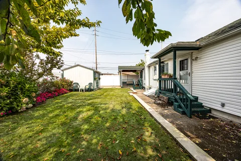 a view of a house with basketball court