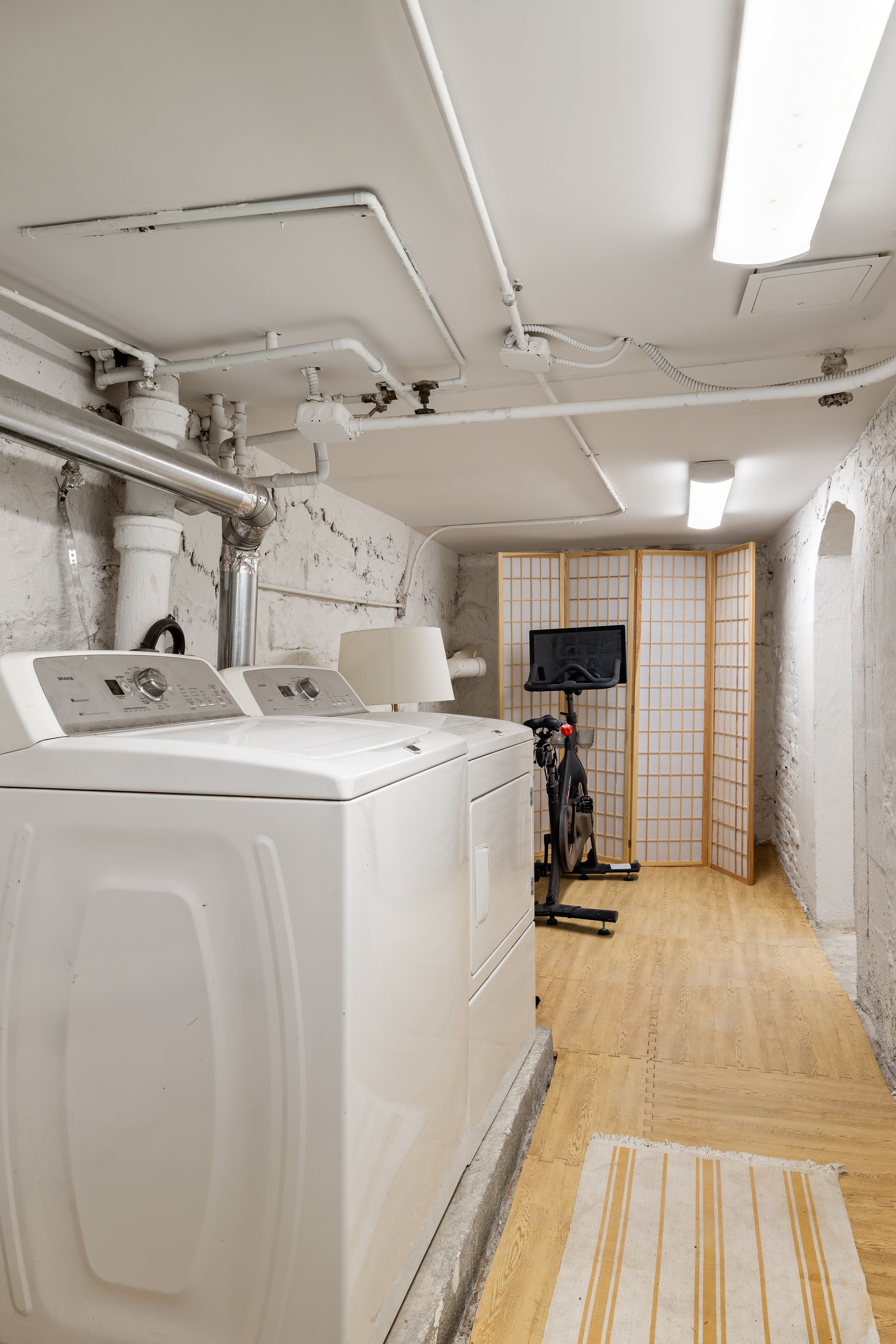 417 Clinton Street, Unit 1 Brooklyn, NY 11231 - Photo 15 of 18 a view of a room with storage and utility room