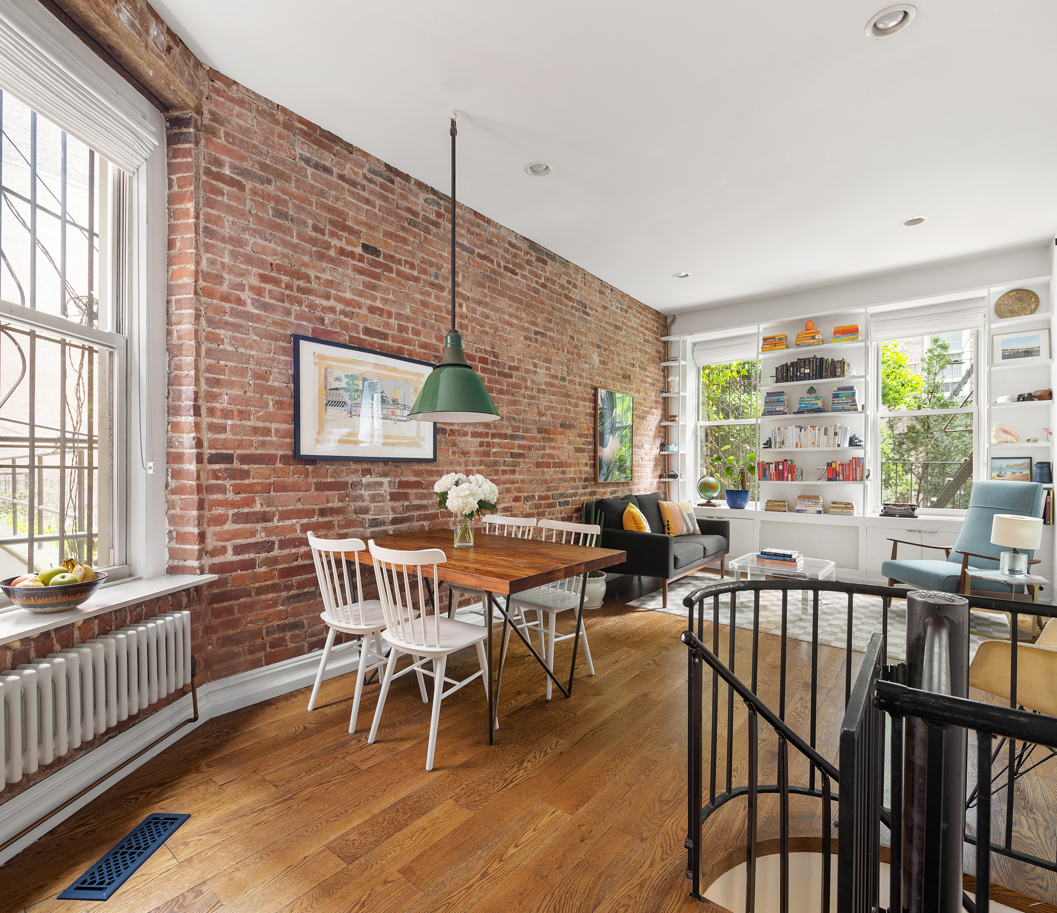 71 East 3rd Street, Unit 4 Manhattan, NY 10003 - Photo 2 of 18 a view of a dining room with furniture window and outside view