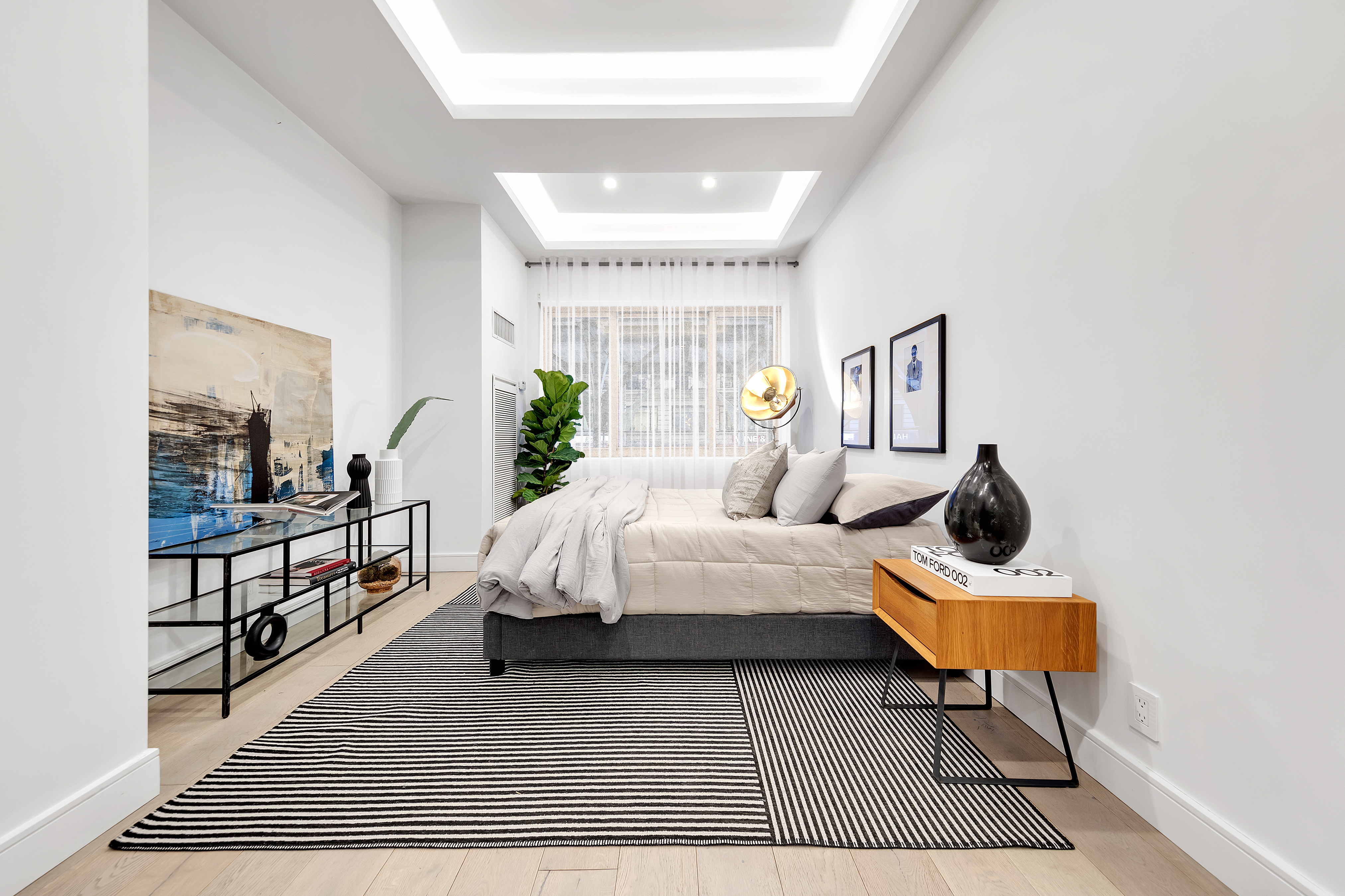 106 Central Park South, Unit 2B Manhattan, NY 10019 - Photo 3 of 12 a living room with furniture and a table