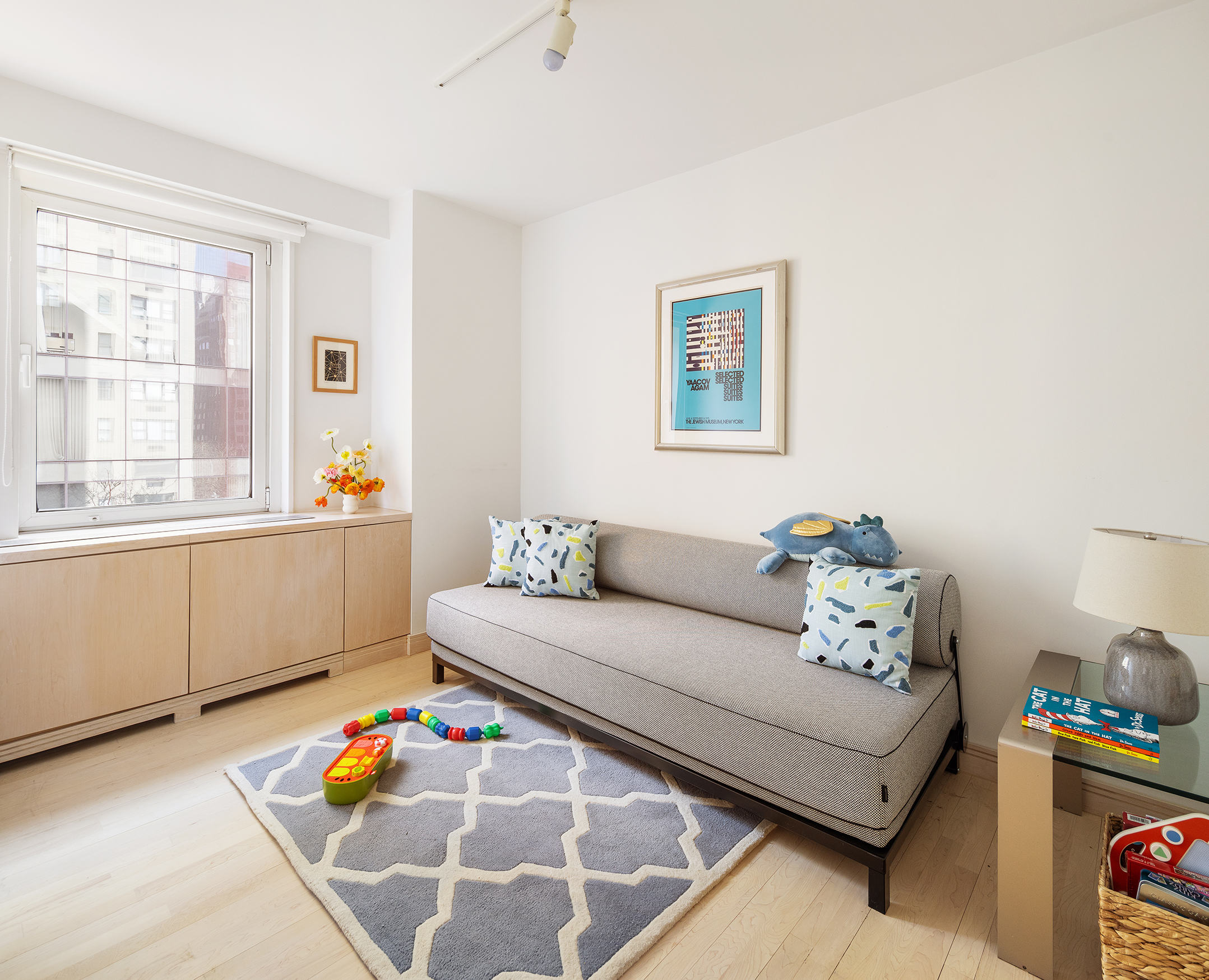 1065 Park Avenue, Unit 5BC Manhattan, NY 10128 - Photo 11 of 16 a living room with furniture and window