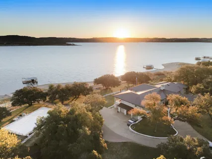 a lobby with furniture and flat screen tv