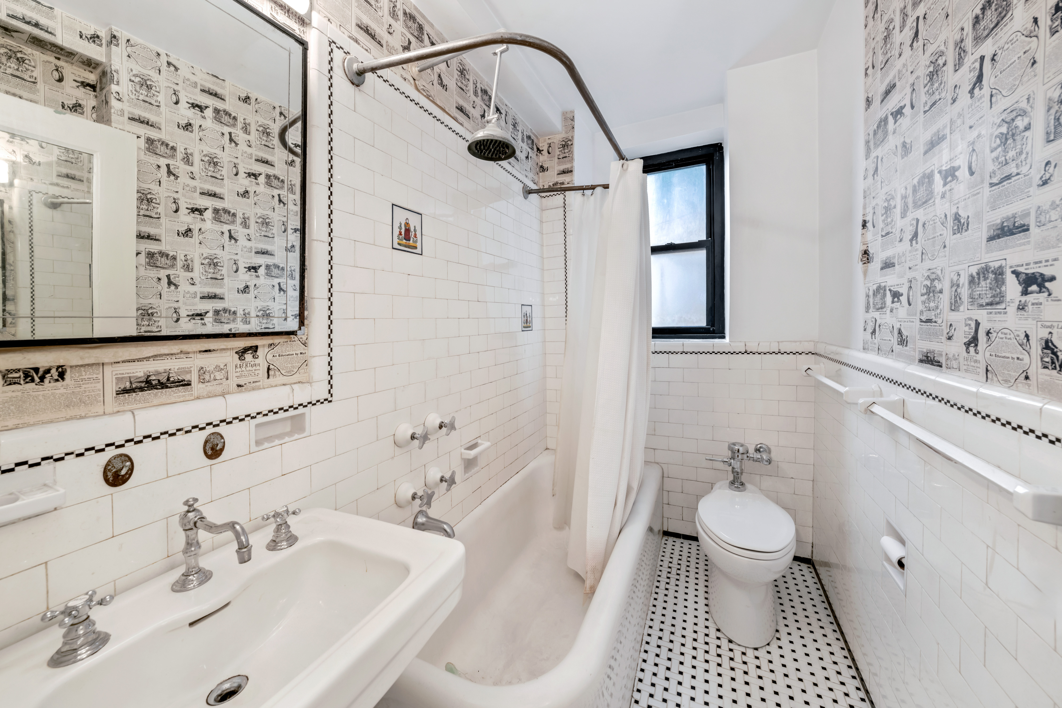 235 East 22nd Street, Unit 9M Manhattan, NY 10010 - Photo 7 of 15 a bathroom with a sink toilet and shower