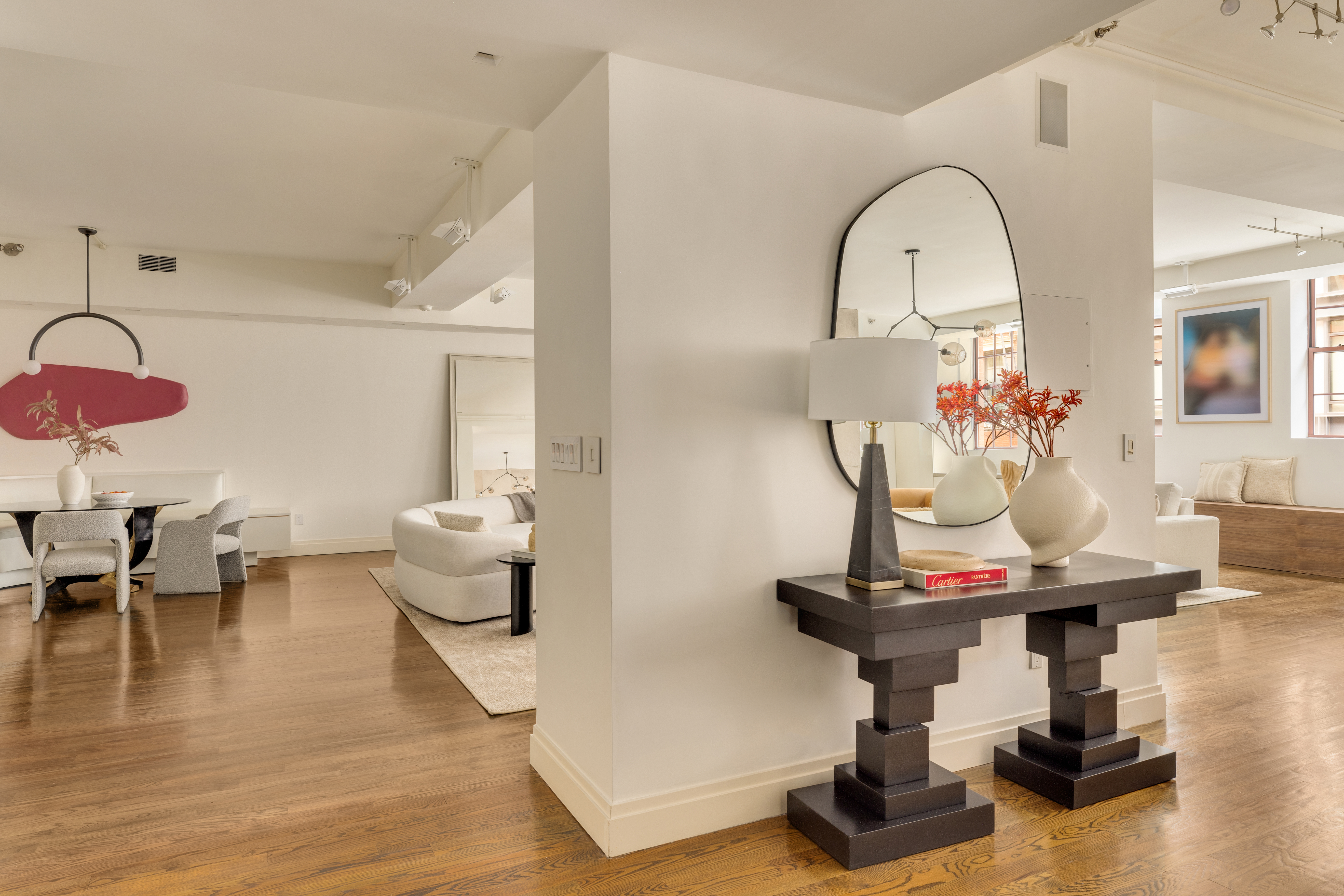 18 Leonard Street, Unit 2D Manhattan, NY 10013 - Photo 9 of 22 a view of a dining room with furniture and wooden floor