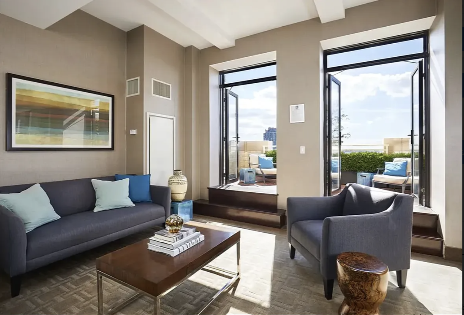 1 Hanson Place, Unit 25C Brooklyn, NY 11243 - Photo 9 of 18 a living room with furniture and a large window