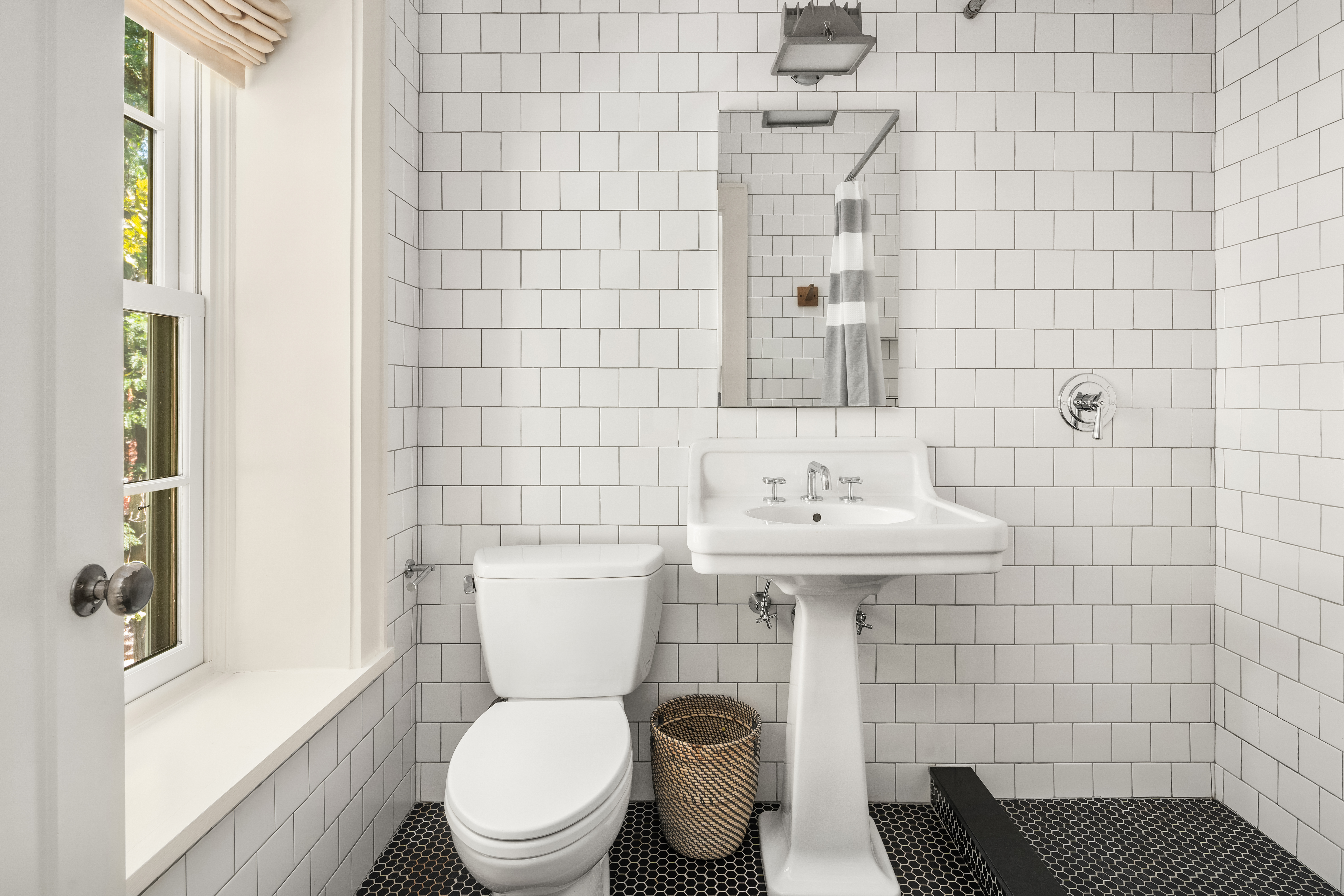 168 Bergen Street Brooklyn, NY 11217 - Photo 20 of 25 a bathroom with a sink a toilet and shower