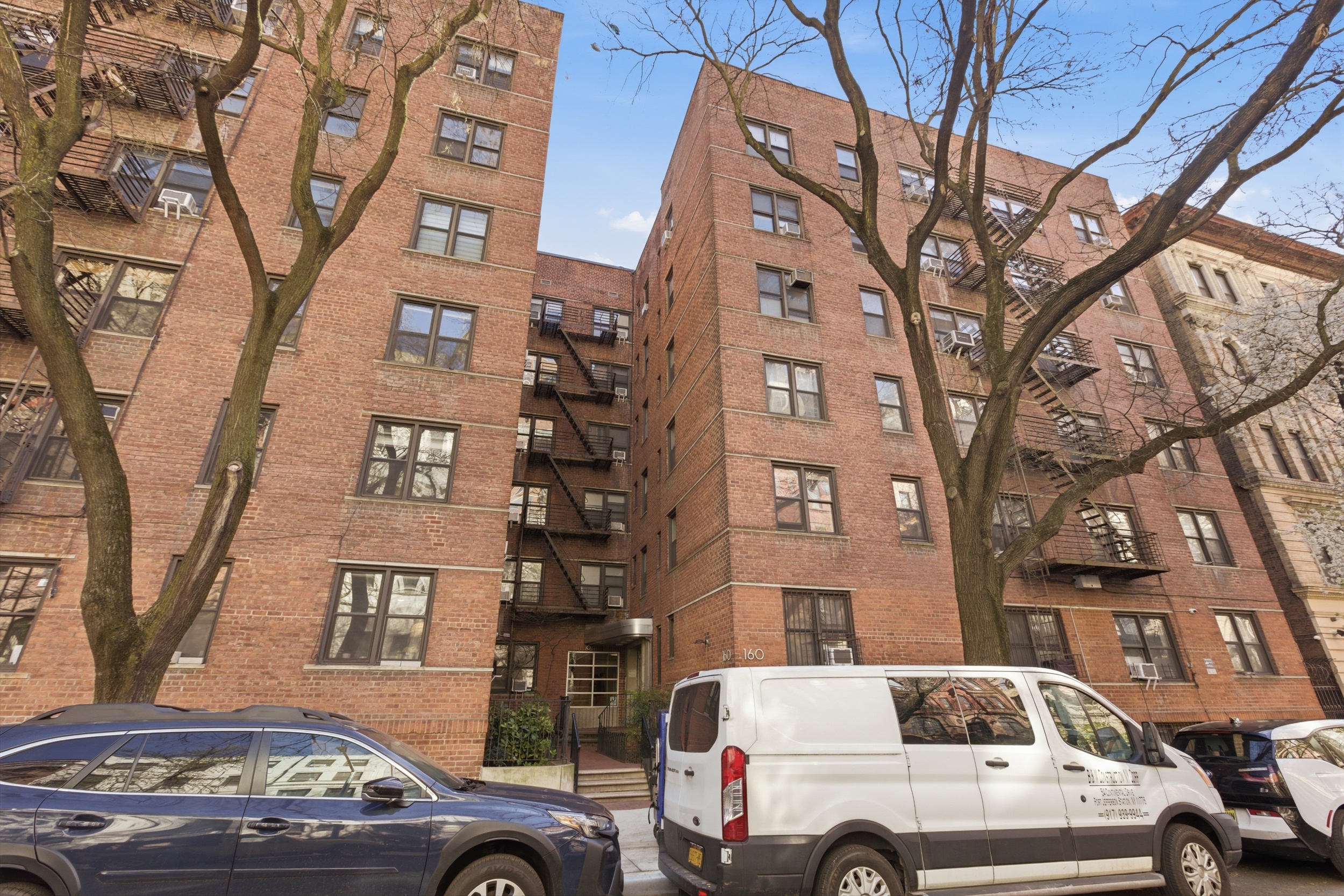 160 West 85th Street, Unit 6K Manhattan, NY 10024 - Photo 9 of 10 a front view of a building with large trees