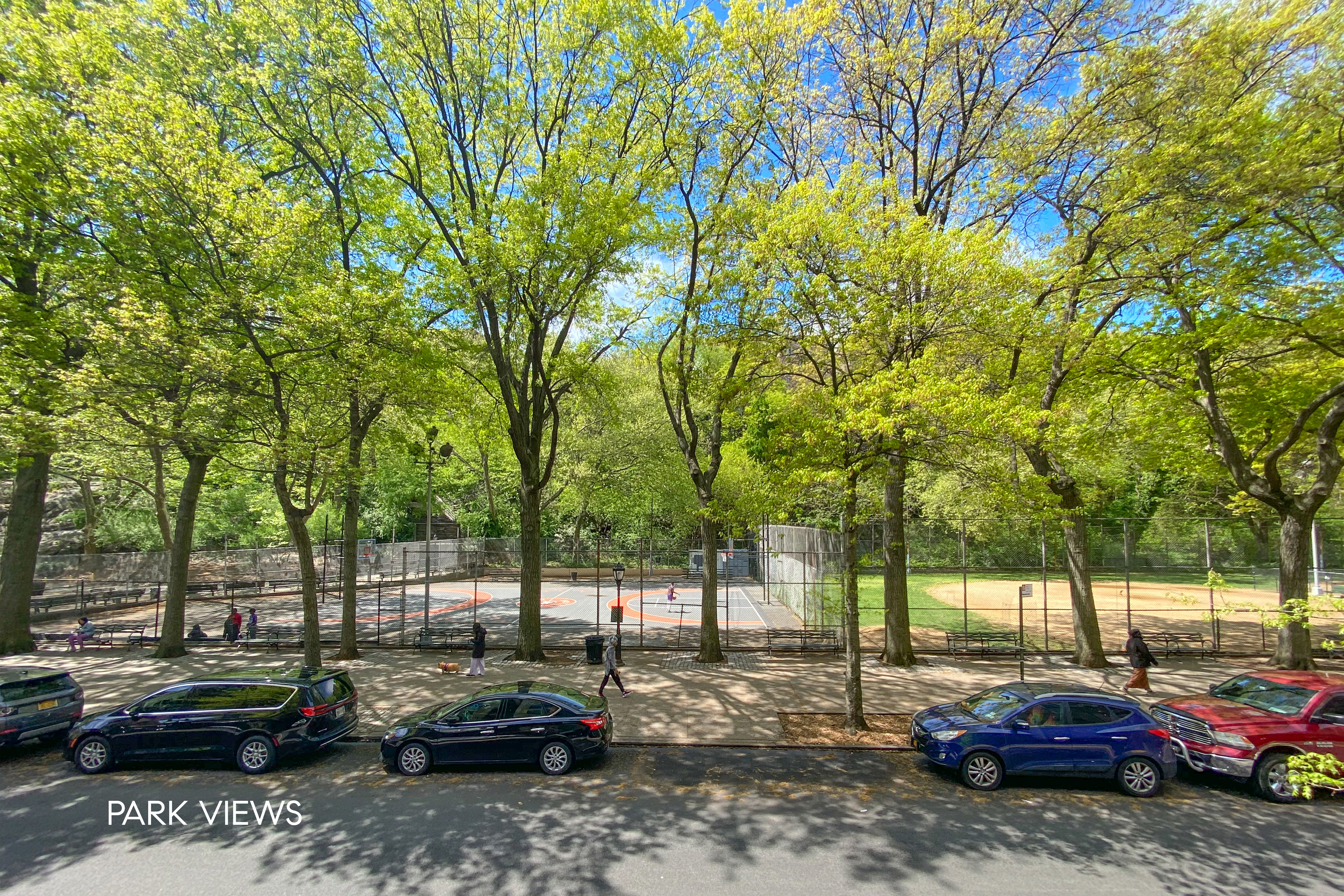 305 West 150th Street, Unit 206 Manhattan, NY 10039 - Photo 3 of 18 a view of cars parked on the side of a street