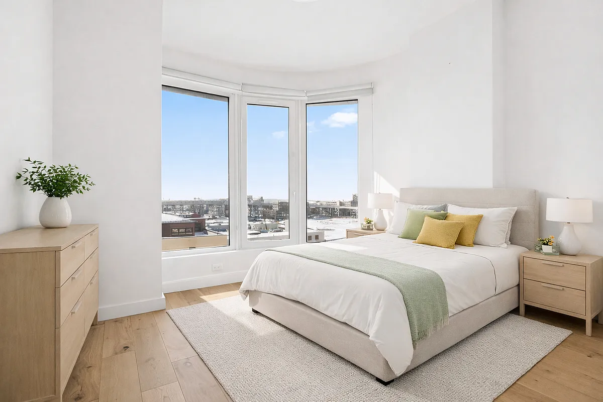 130 2nd Street, Unit 10K Brooklyn, NY 11231 - Photo 4 of 20 a bedroom with a large bed and a large window
