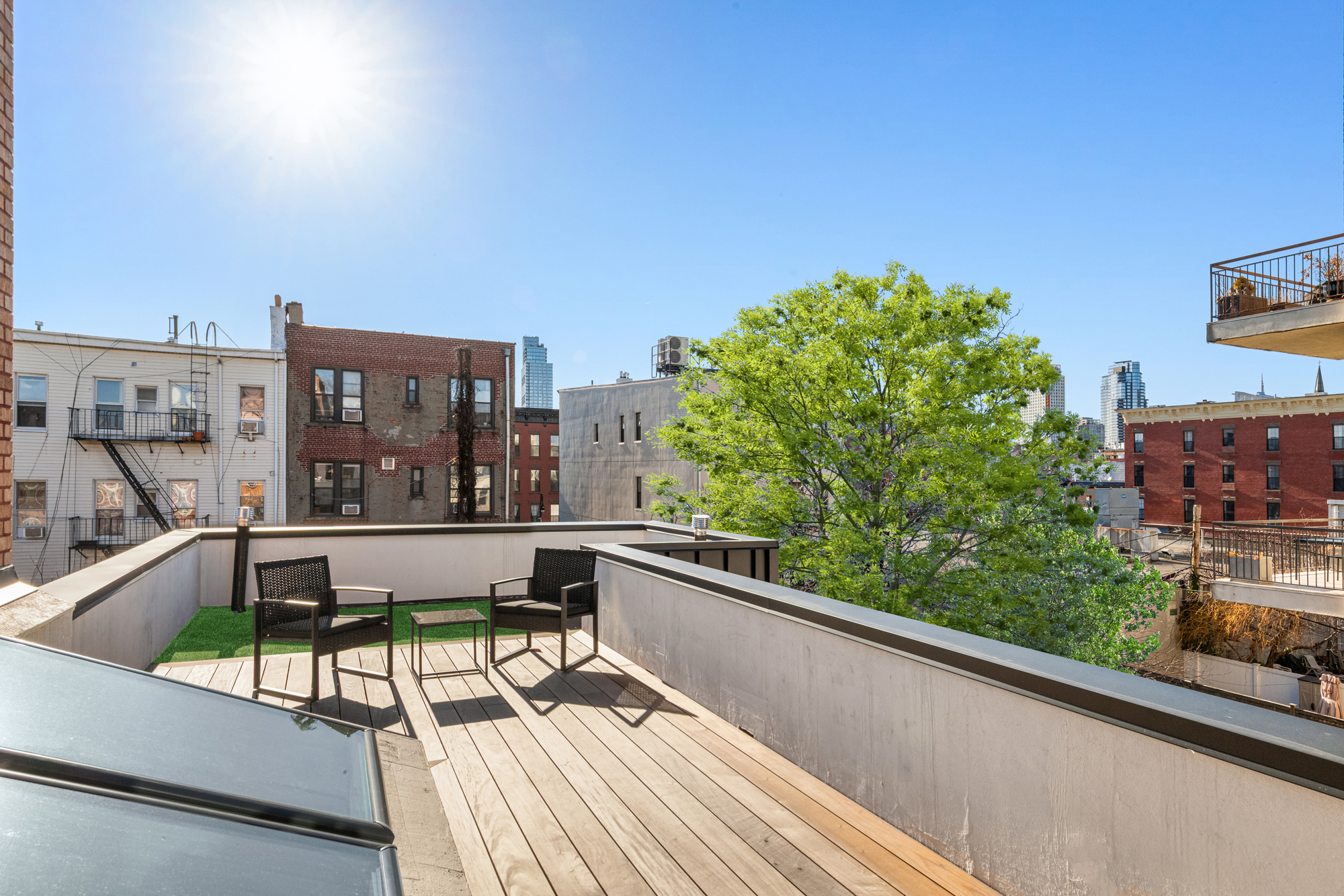 683 Leonard Street Brooklyn, NY 11222 - Photo 18 of 25 a view of balcony with a potted plant