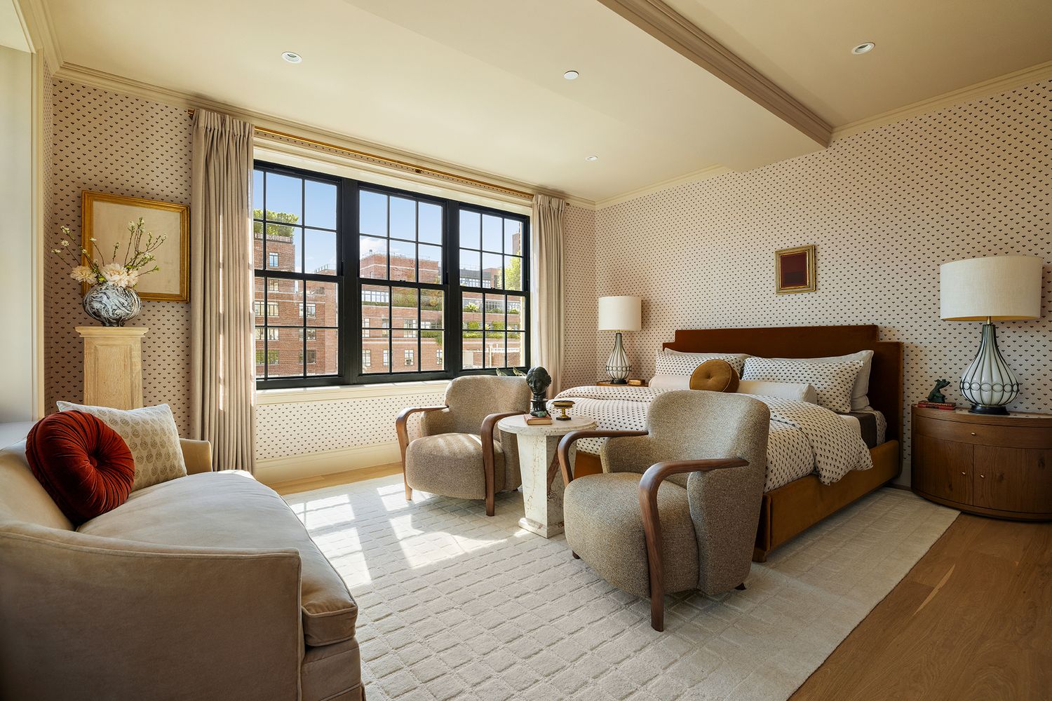 a bedroom with bed and a large window