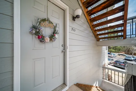 a view of a room that has a bench in it