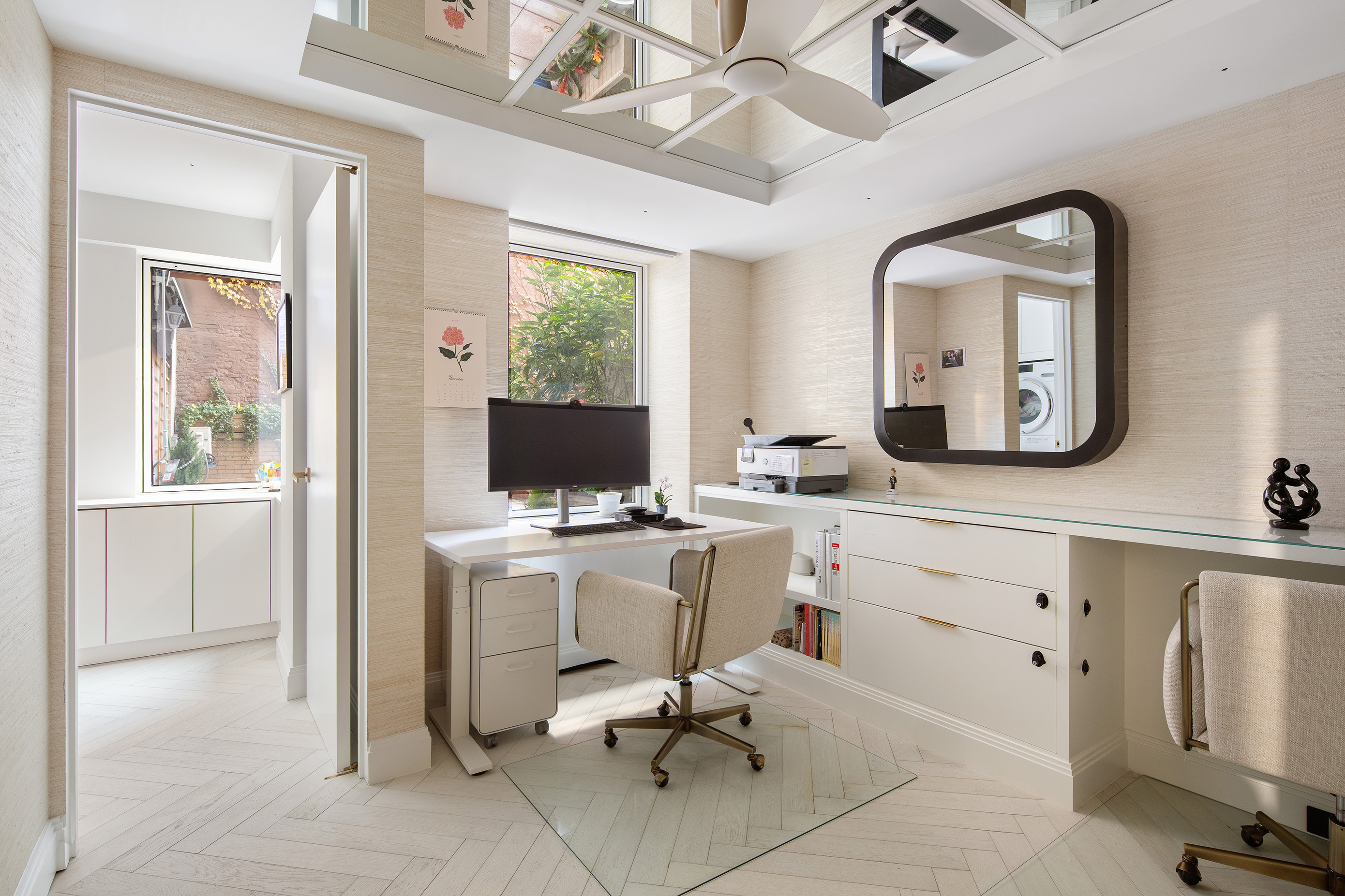 923 5th Avenue, Unit 2A Manhattan, NY 10021 - Photo 10 of 14 a view of a livingroom with workspace and a window