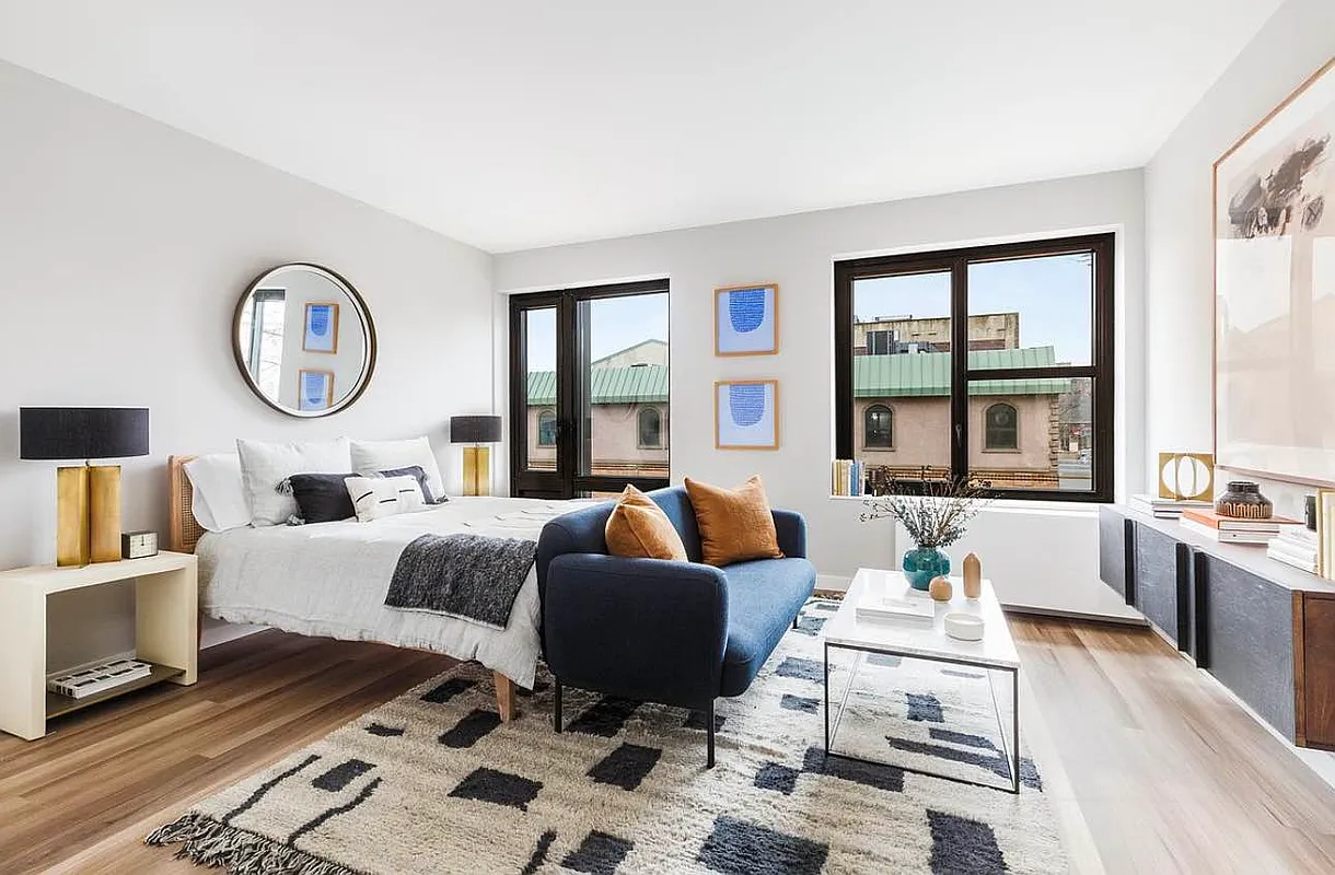 2415 Church Avenue, Unit 204 Brooklyn, NY 11226 - Photo 1 of 5 a living room with furniture a table and a large window