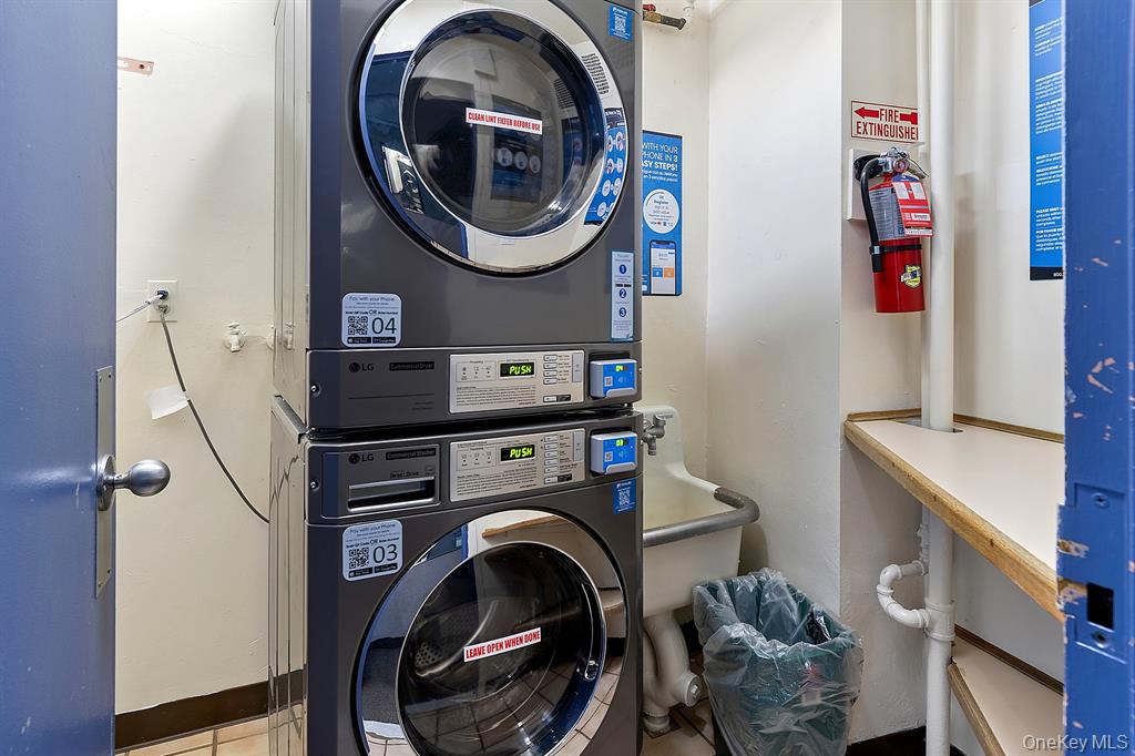 2400 Johnson Avenue, Unit 3B Bronx, NY 10463 - Photo 18 of 28 a utility room with dryer and washer
