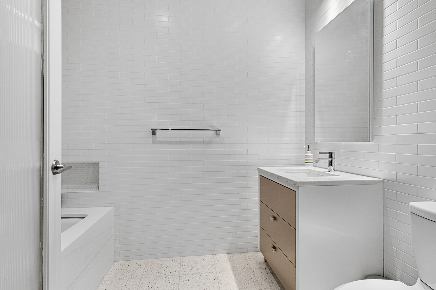 15 Hubert Street, Unit 2C Manhattan, NY 10013 - Photo 9 of 15 a bathroom with a sink a toilet and shower
