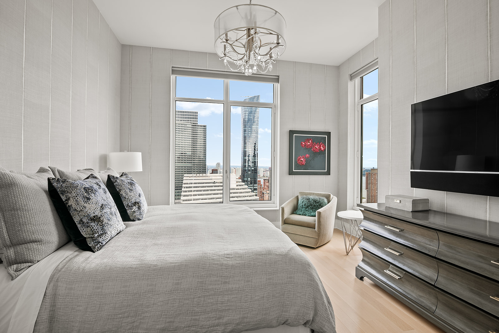 30 Park Place, Unit 43A Manhattan, NY 10007 - Photo 6 of 13 a bedroom with a bed and glass window