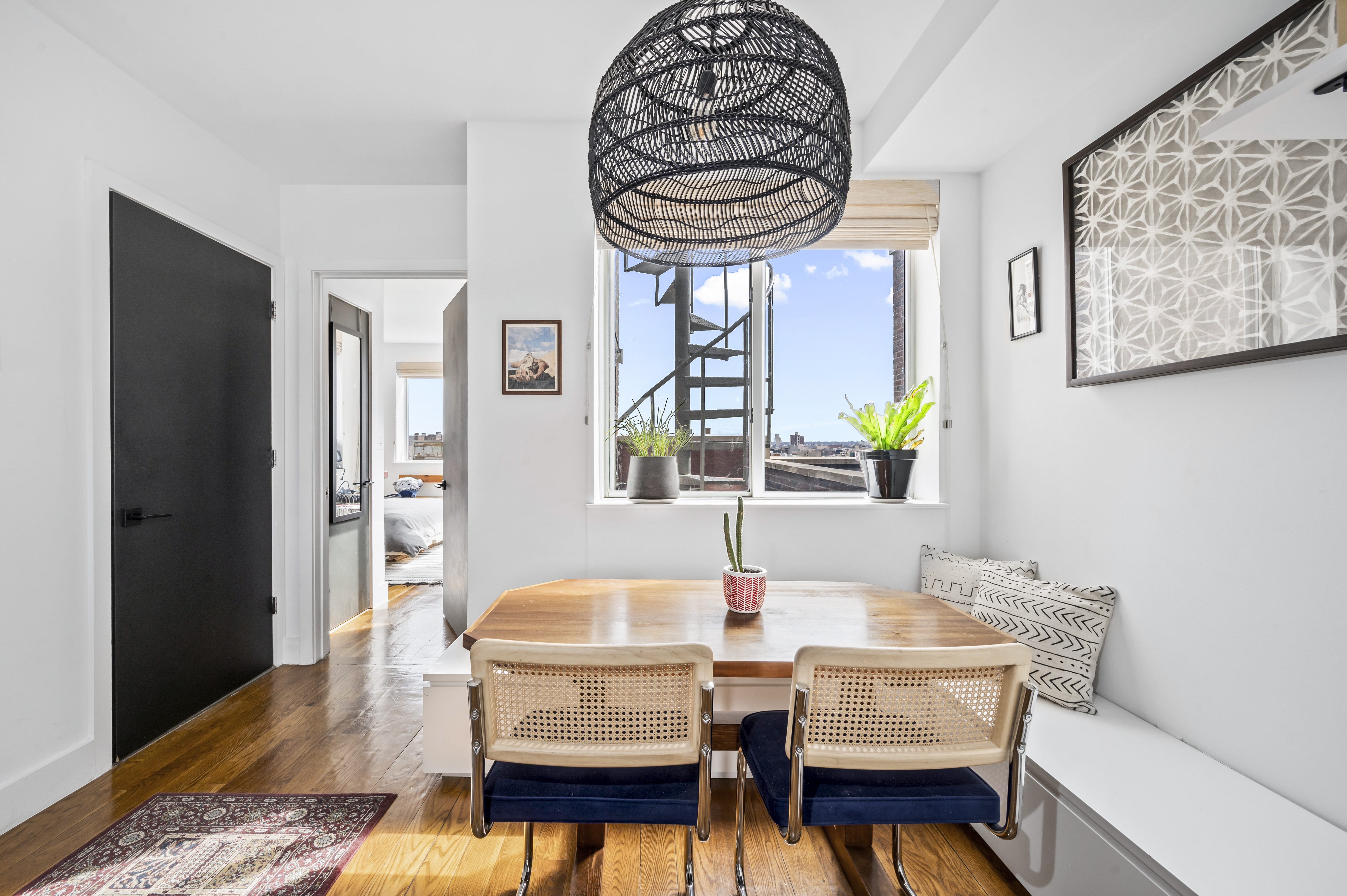 191 Spencer Street, Unit 9A Brooklyn, NY 11205 - Photo 5 of 10 a dining room with furniture and window