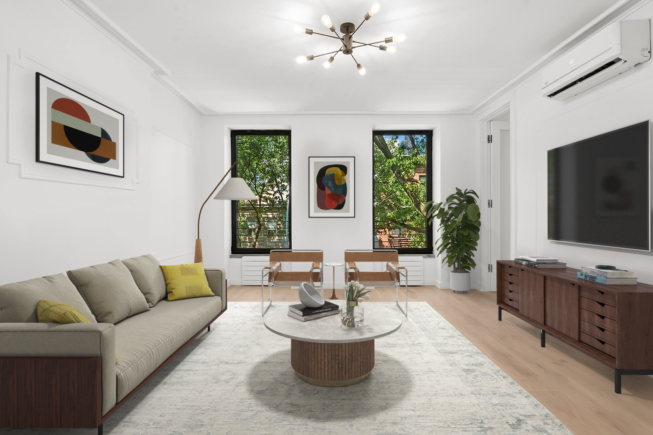 a living room with furniture and a flat screen tv