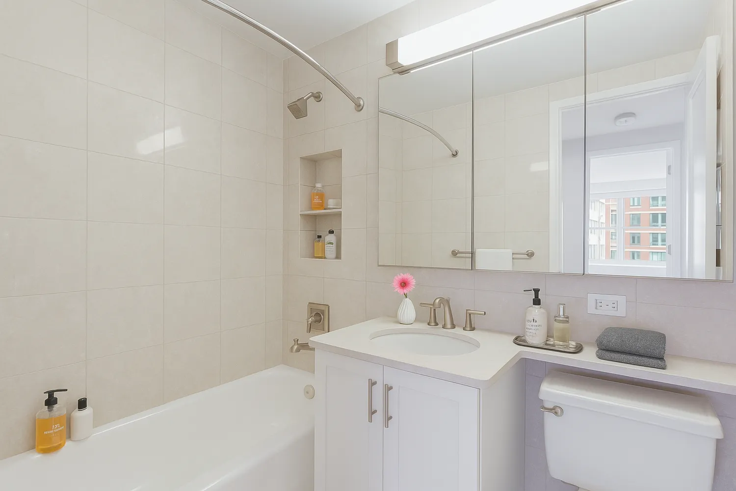 a bathroom with a sink a vanity and a bathtub