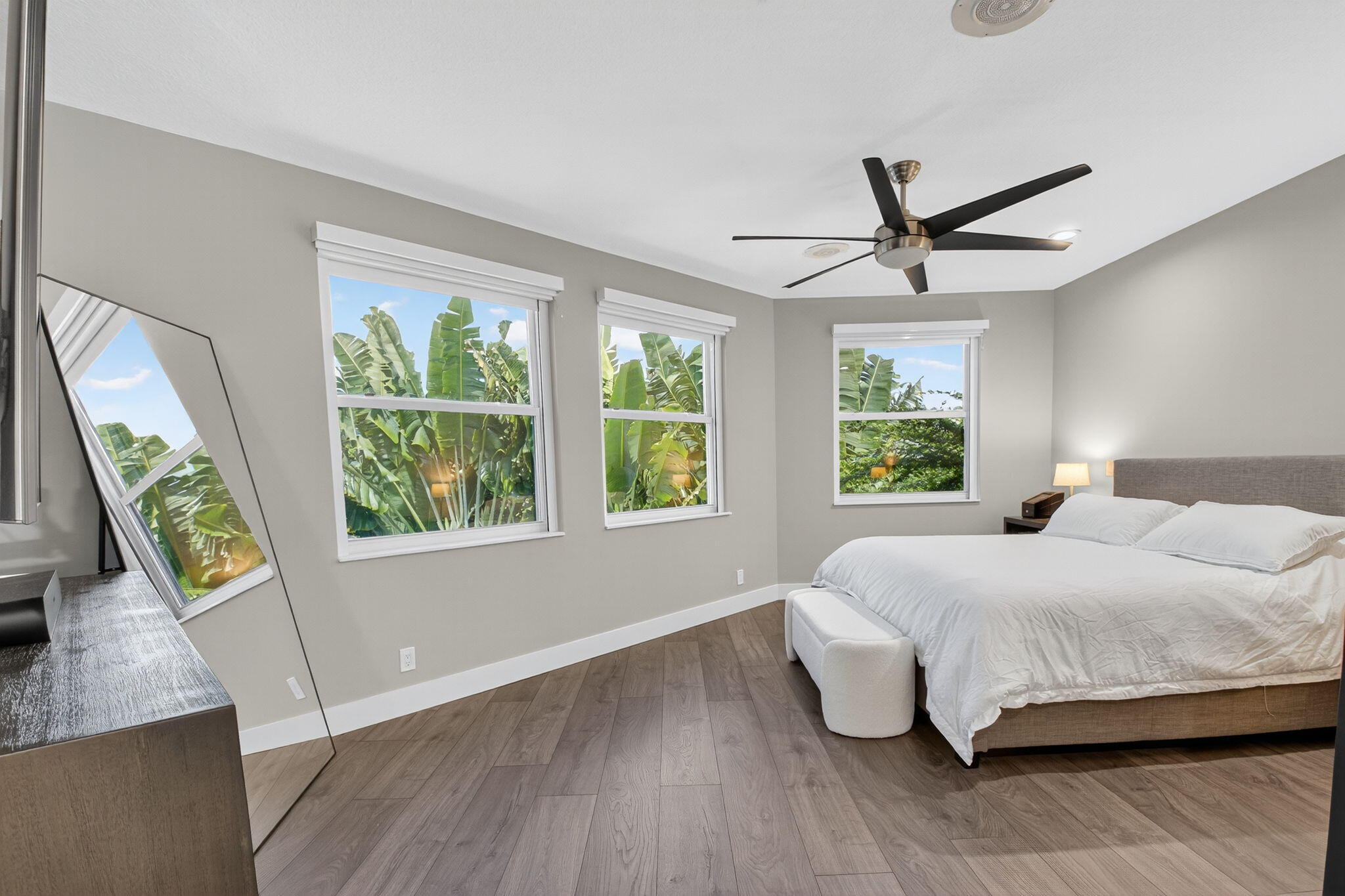 6529 Somerset Circle Boca Raton, FL 33496 - Photo 25 of 75 a bedroom with a large bed and a large window