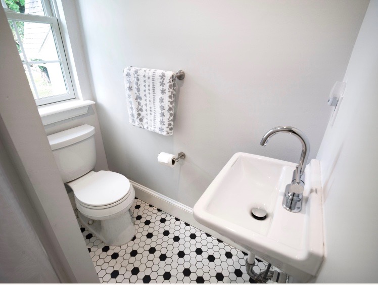 319 West Conestoga Road Devon, PA 19333 - Photo 25 of 38 a bathroom with a sink toilet and window